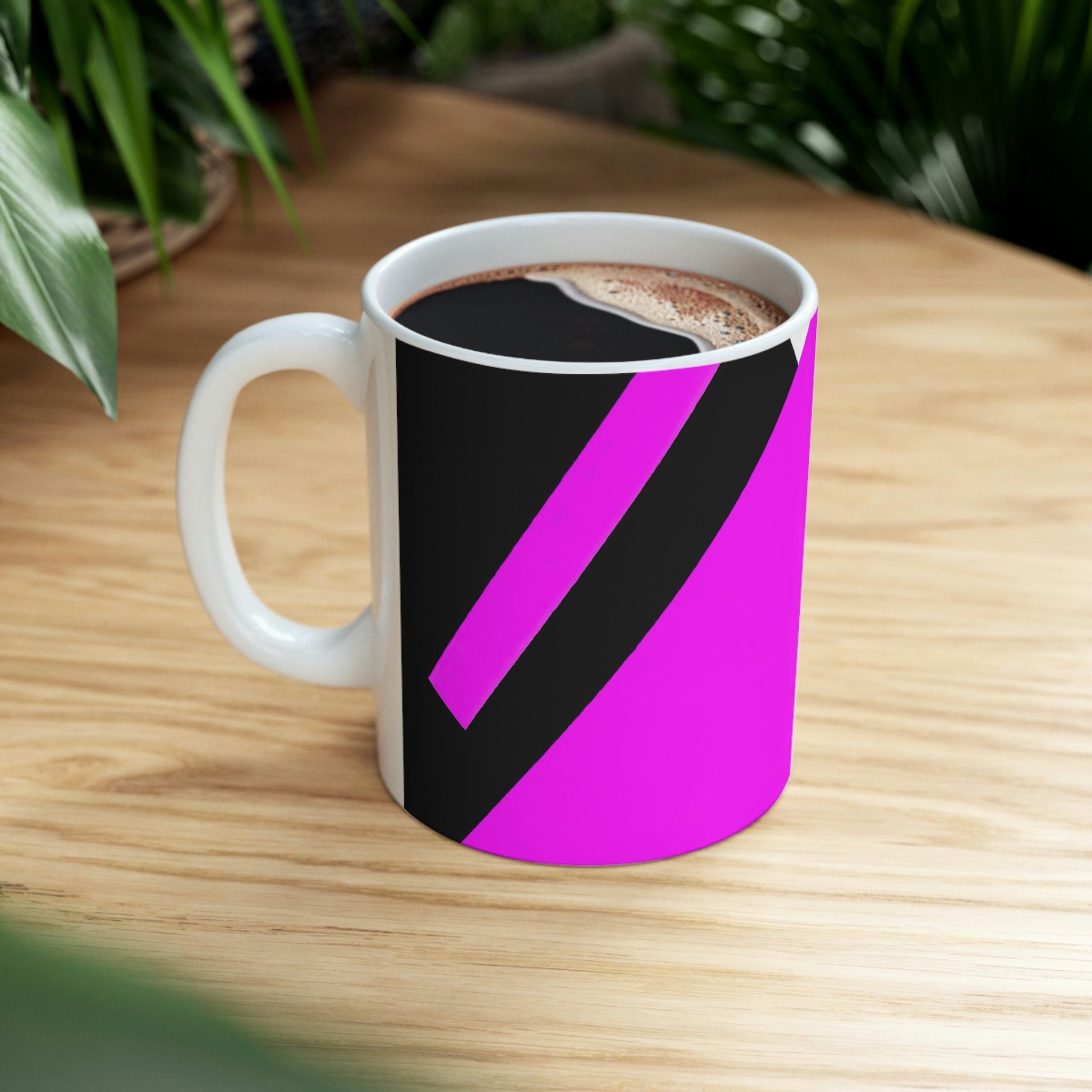 Decorative Ceramic Coffee Mug featuring a black and pink geometric pattern, perfect for coffee, tea, and hot chocolate.