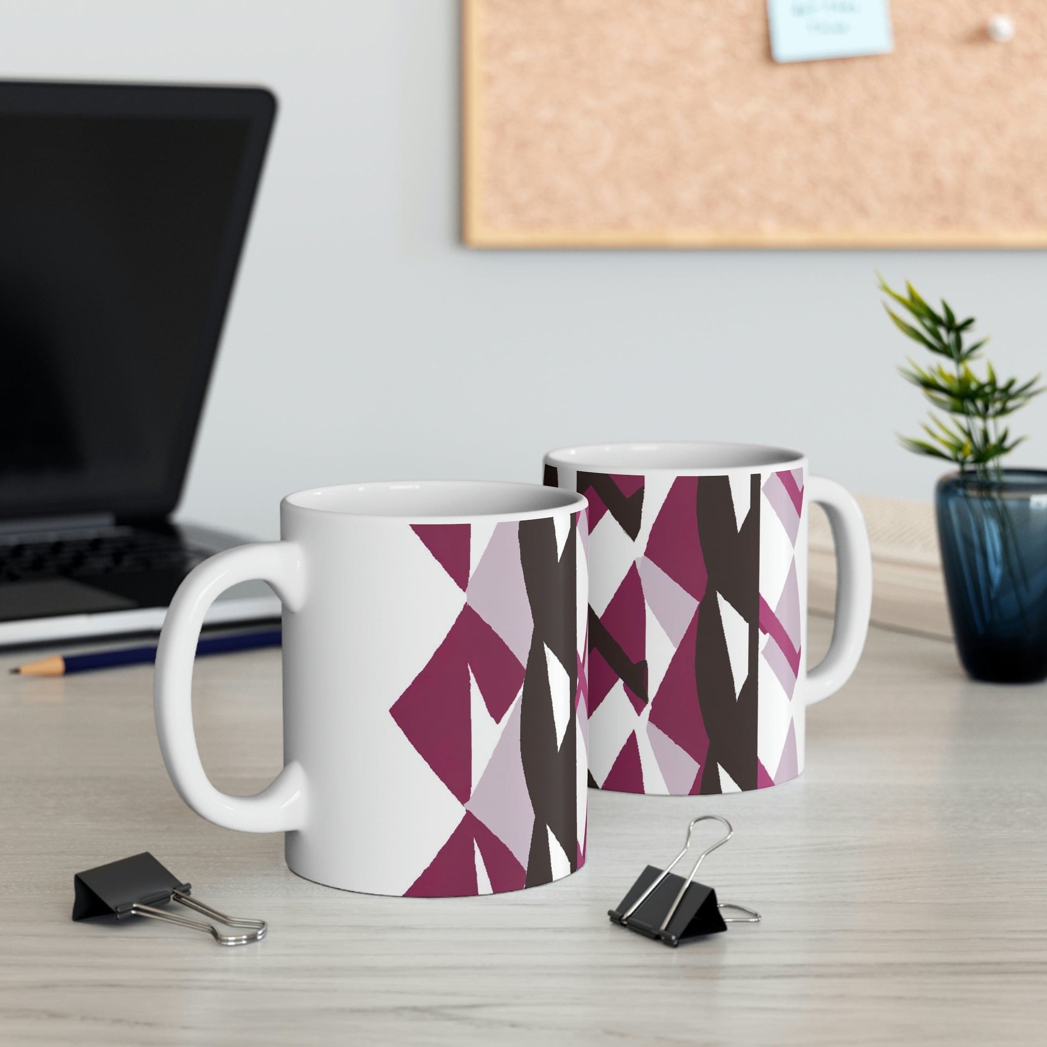 Decorative ceramic coffee mug in mauve pink and maroon geometric pattern, showcasing its elegant design and durable ceramic material.