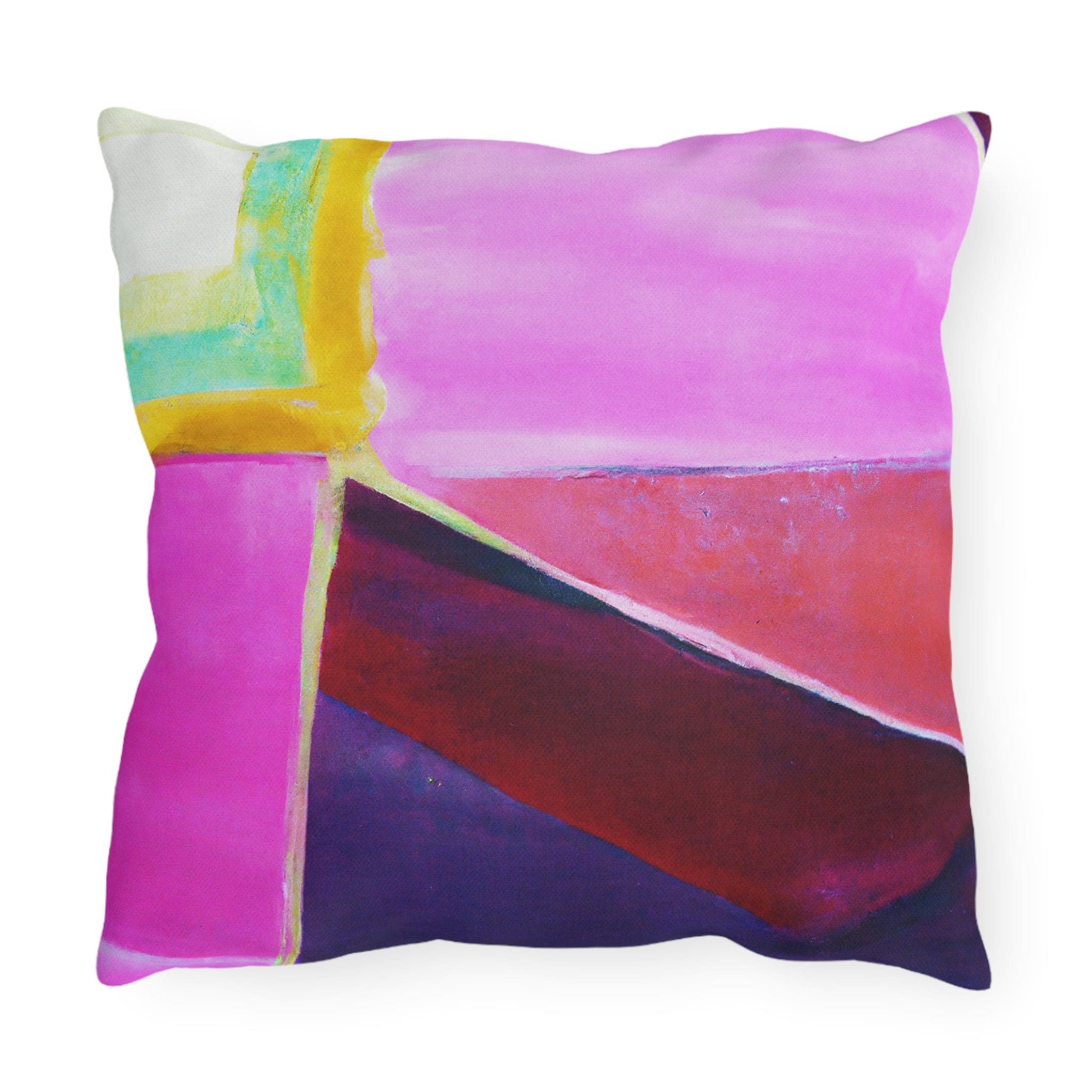 Decorative indoor/outdoor pillow featuring a vibrant pink, purple, and red geometric pattern, ideal for enhancing outdoor decor.