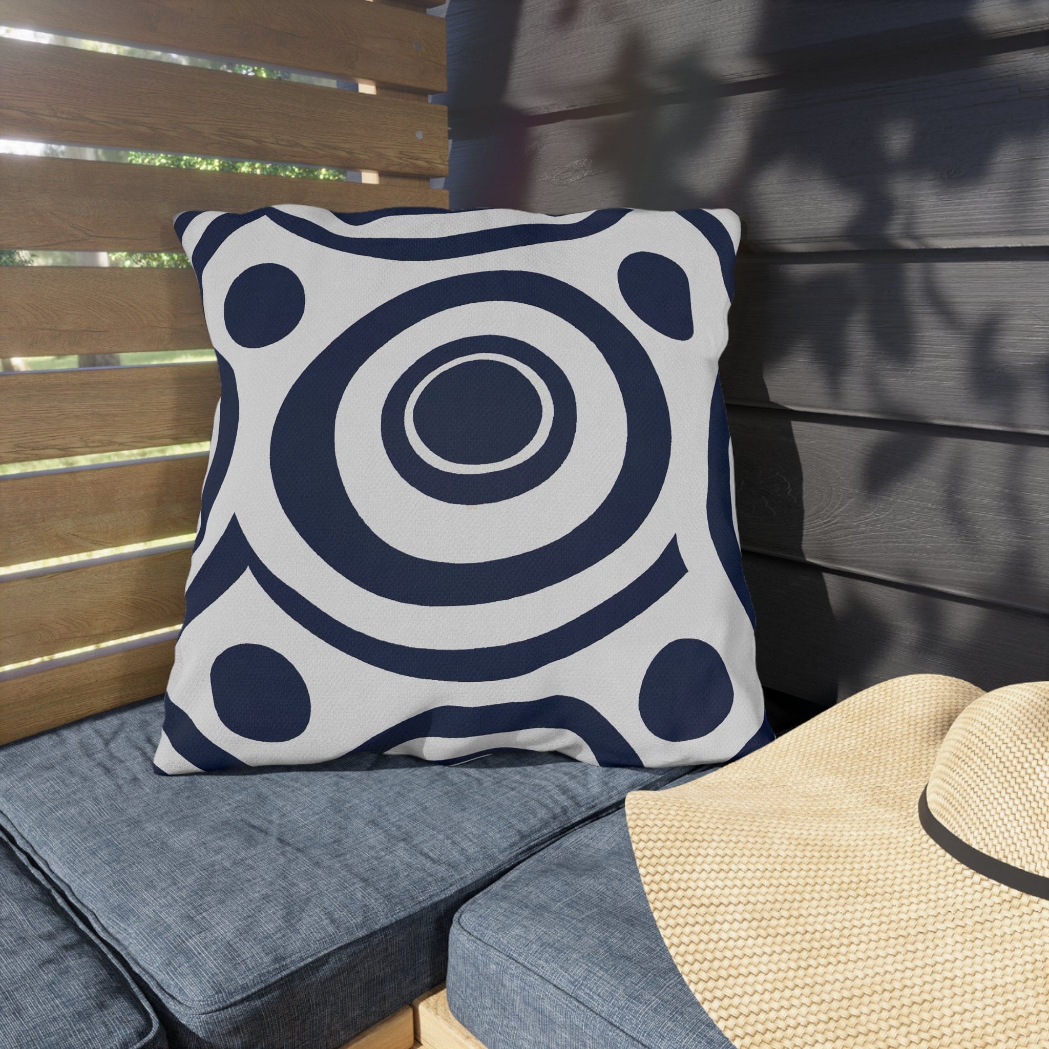 Navy blue and white circular decorative throw pillow designed for indoor and outdoor use, showcasing vibrant patterns and quality craftsmanship.