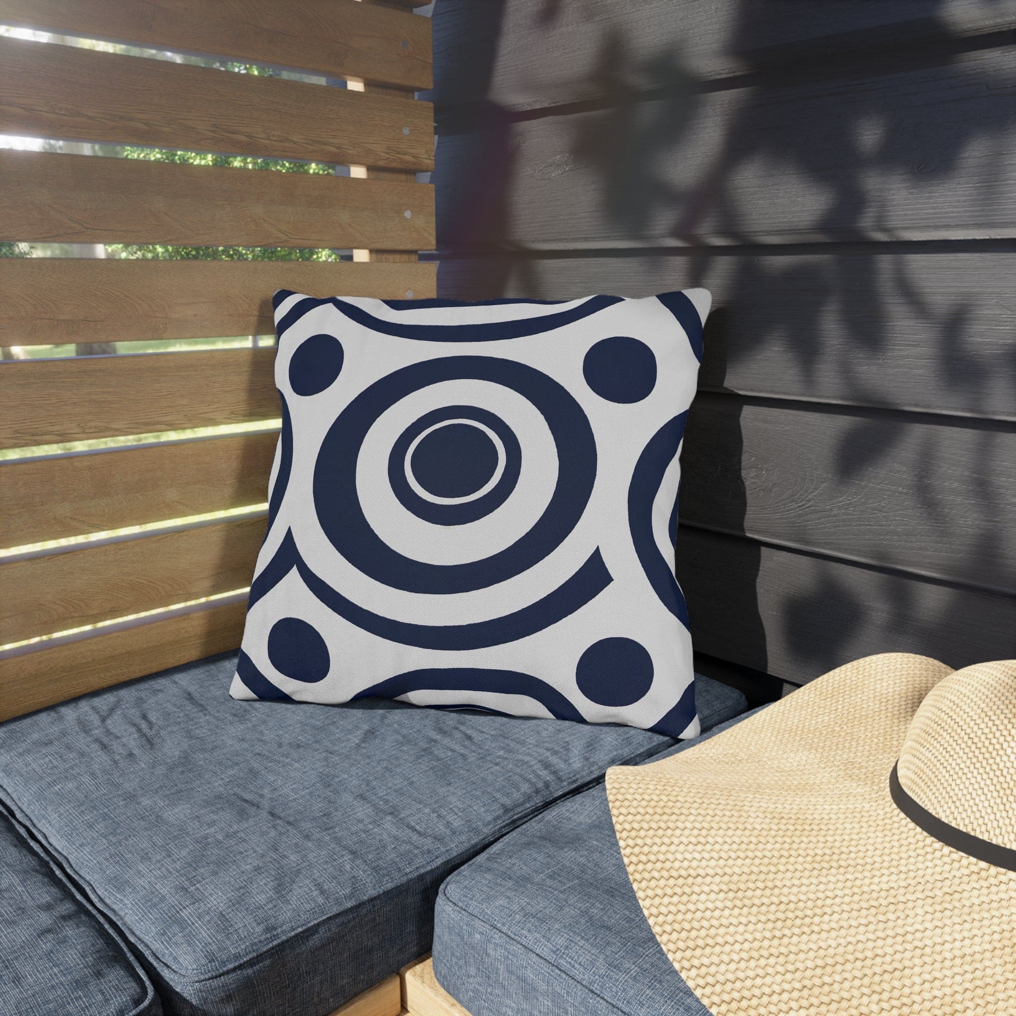 Navy blue and white circular decorative throw pillow designed for indoor and outdoor use, showcasing vibrant patterns and quality craftsmanship.