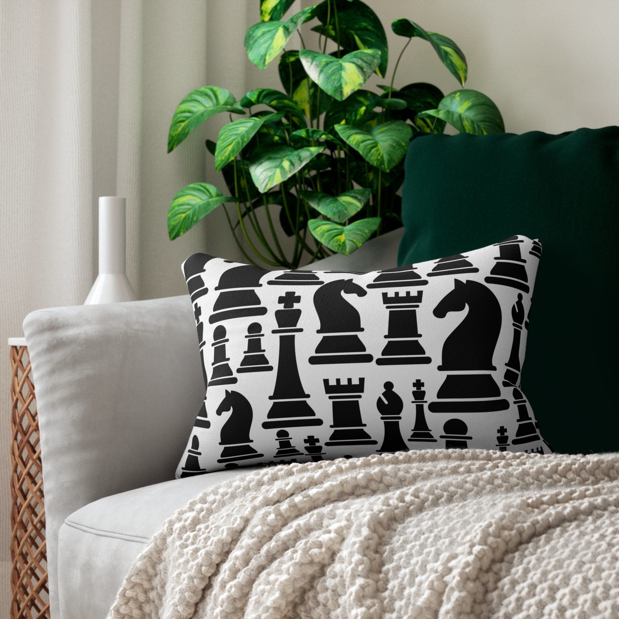 Decorative lumbar throw pillow featuring a black and white chess print, showcasing a stylish design with a concealed zipper and double-sided print.