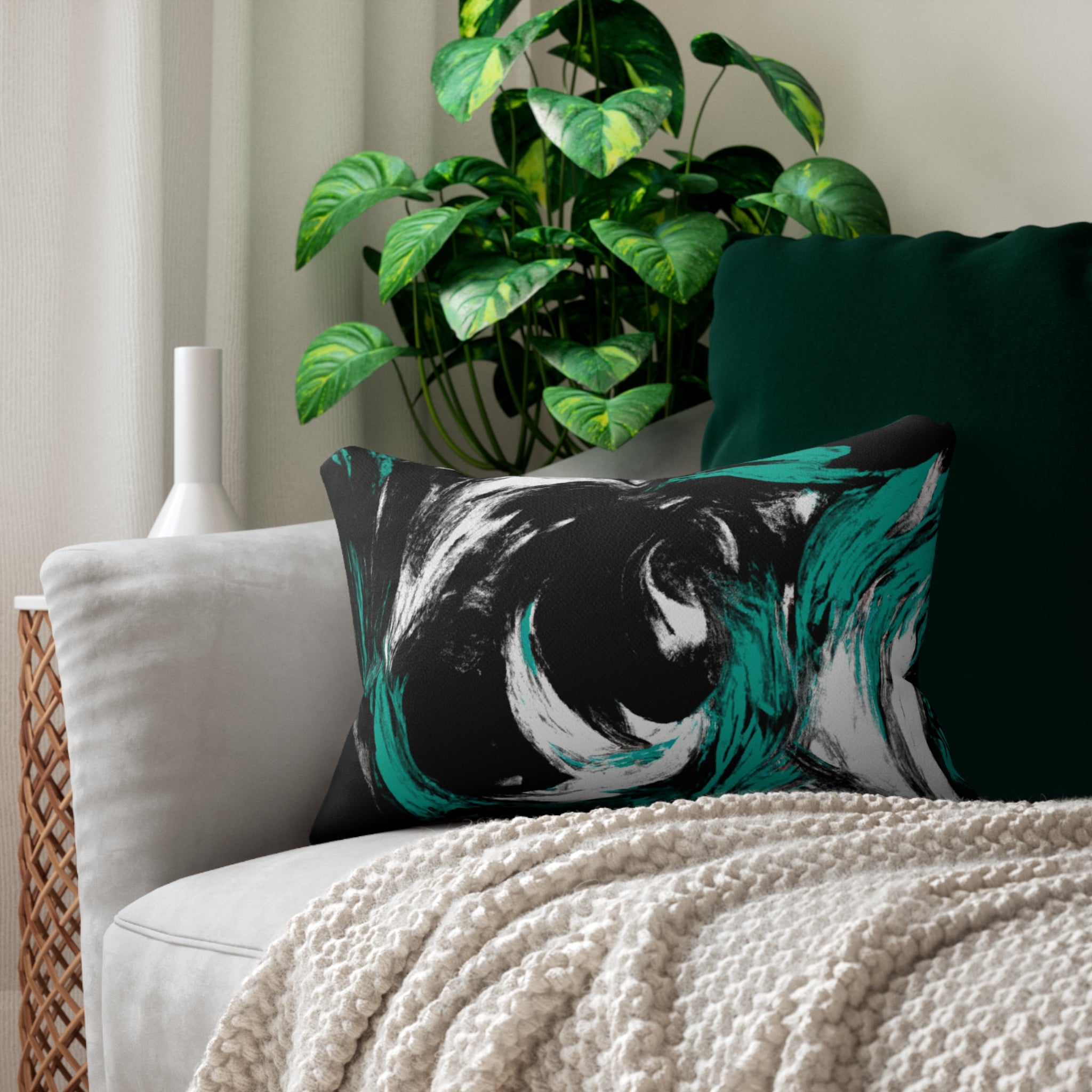 Decorative lumbar throw pillow featuring a black, green, and white abstract pattern, showcasing vibrant colors and artistic design.