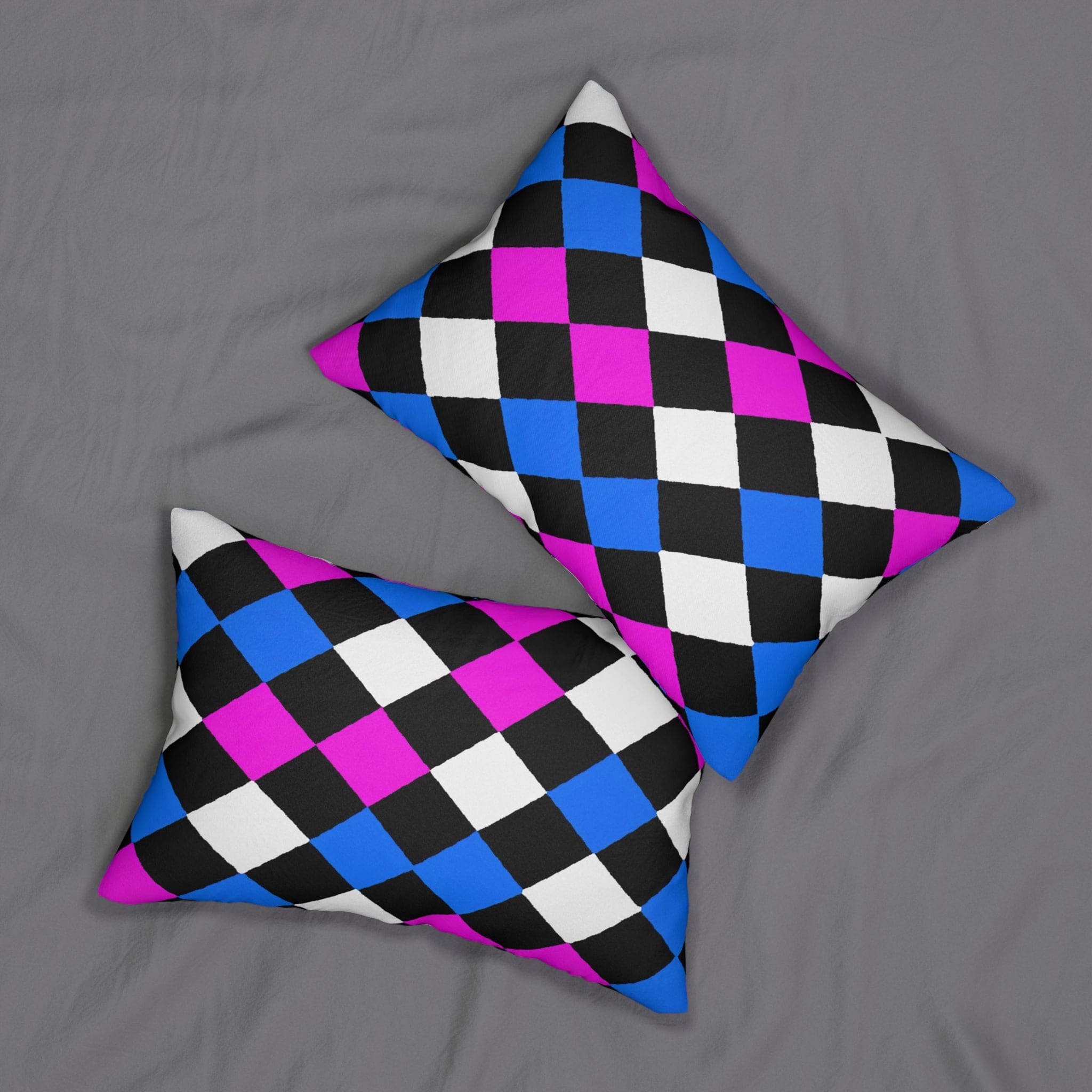 Decorative lumbar throw pillow featuring a vibrant black, pink, and blue checkered pattern, ideal for enhancing home decor.