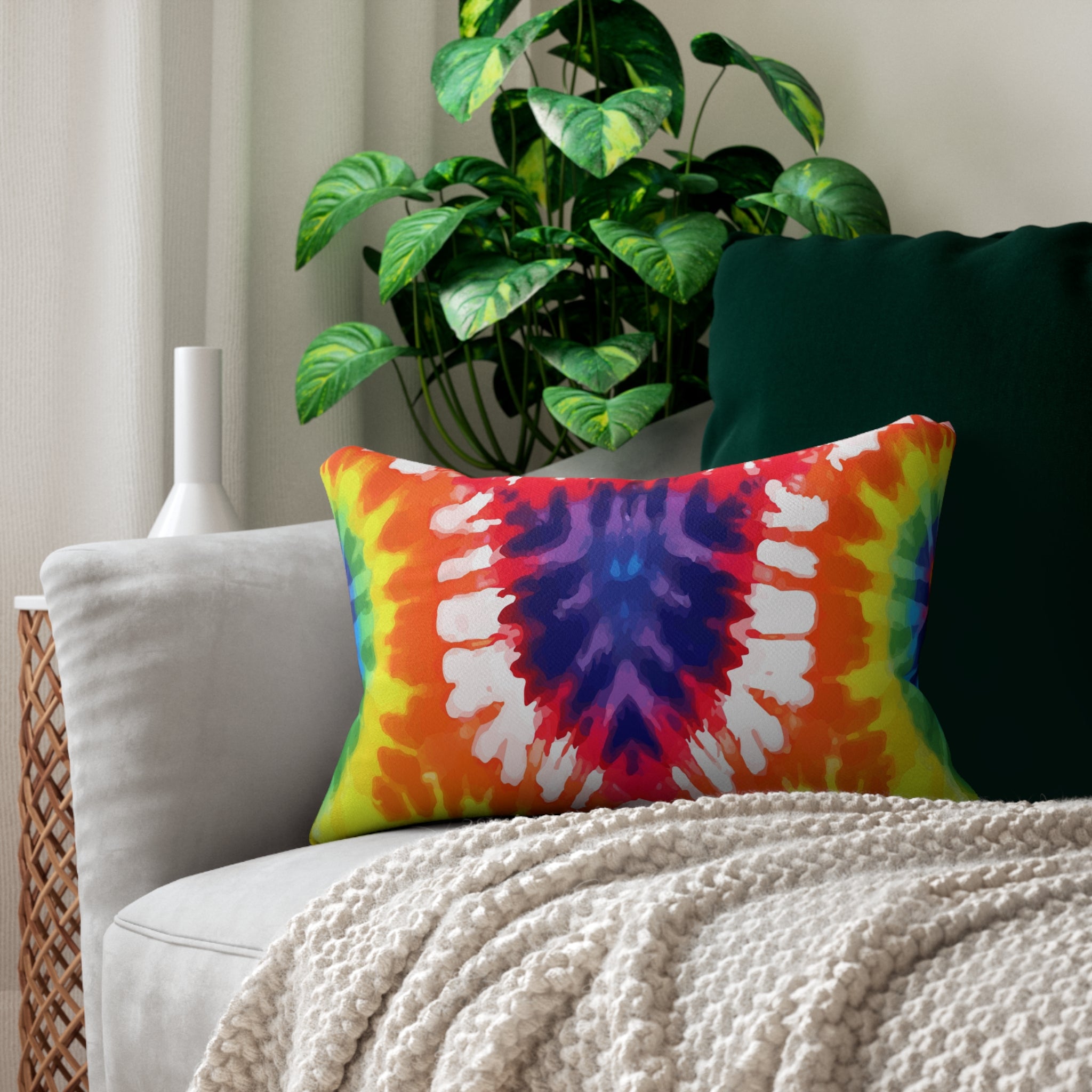 Decorative lumbar throw pillow featuring a vibrant psychedelic rainbow tie dye design, showcasing a colorful and artistic pattern.