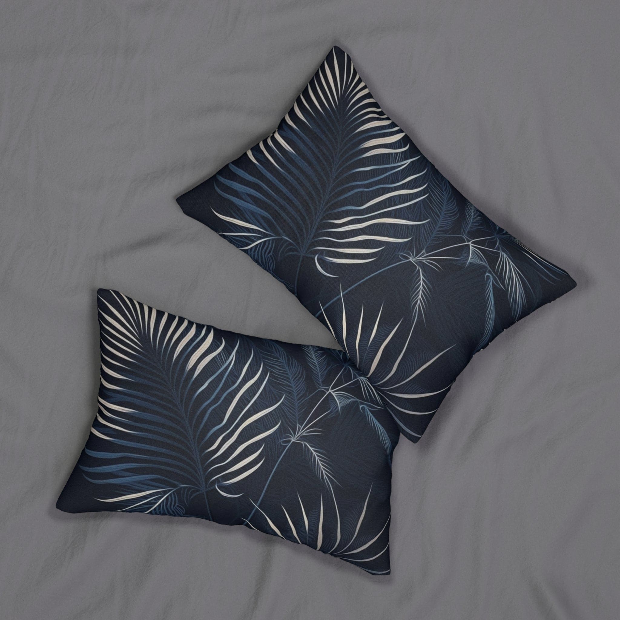 Two pillows with leaf pattern.