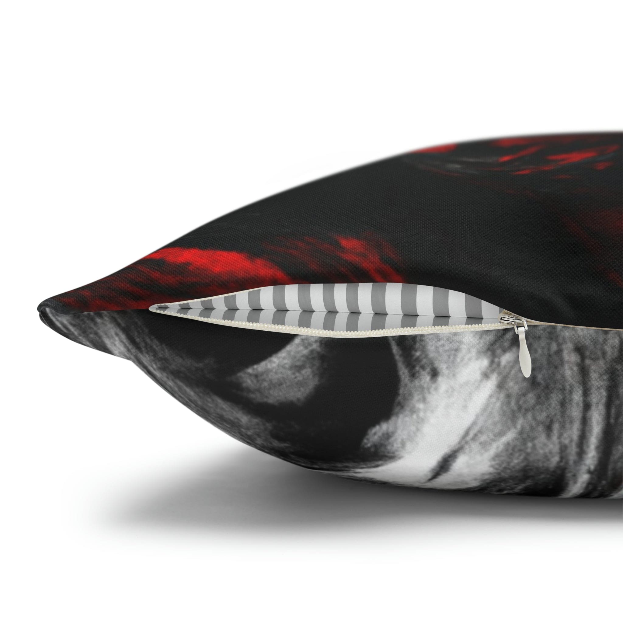 Decorative throw pillow cover featuring a black, red, and white abstract pattern, ideal for enhancing home decor.