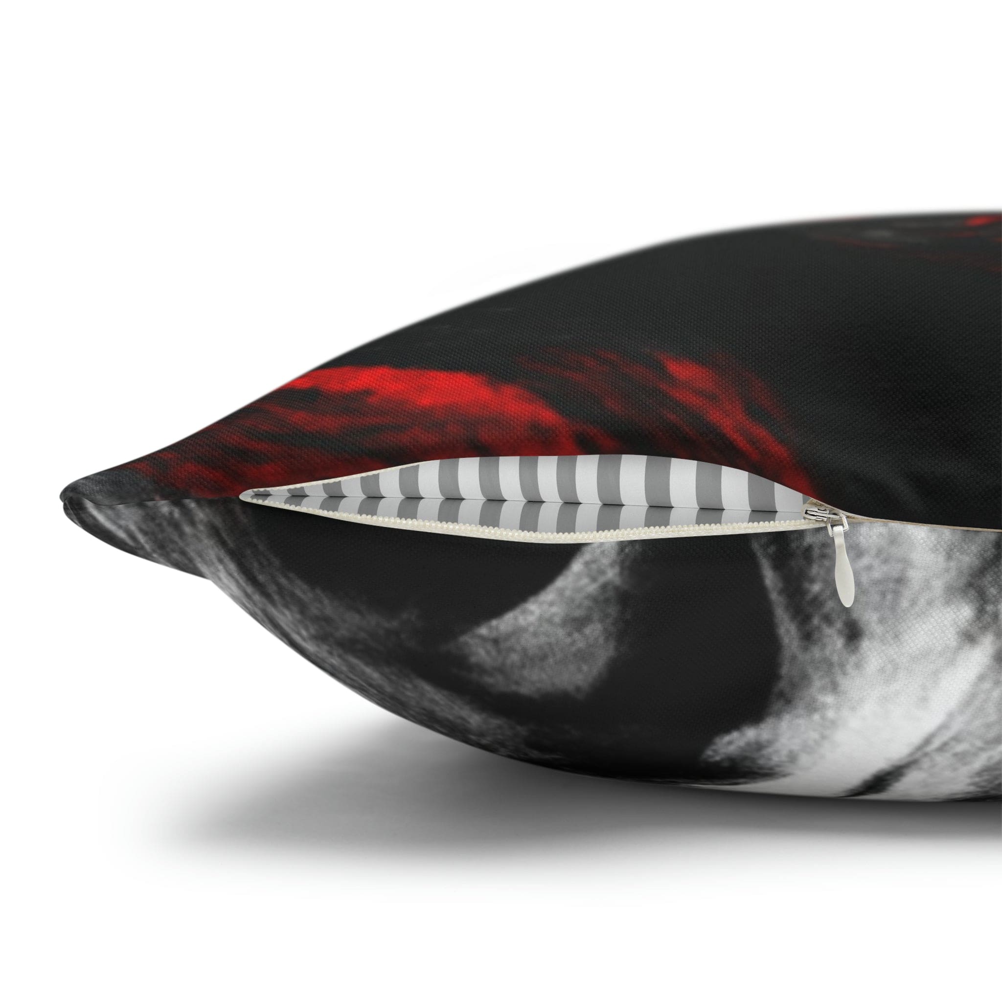 Decorative throw pillow cover featuring a black, red, and white abstract pattern, ideal for enhancing home decor.