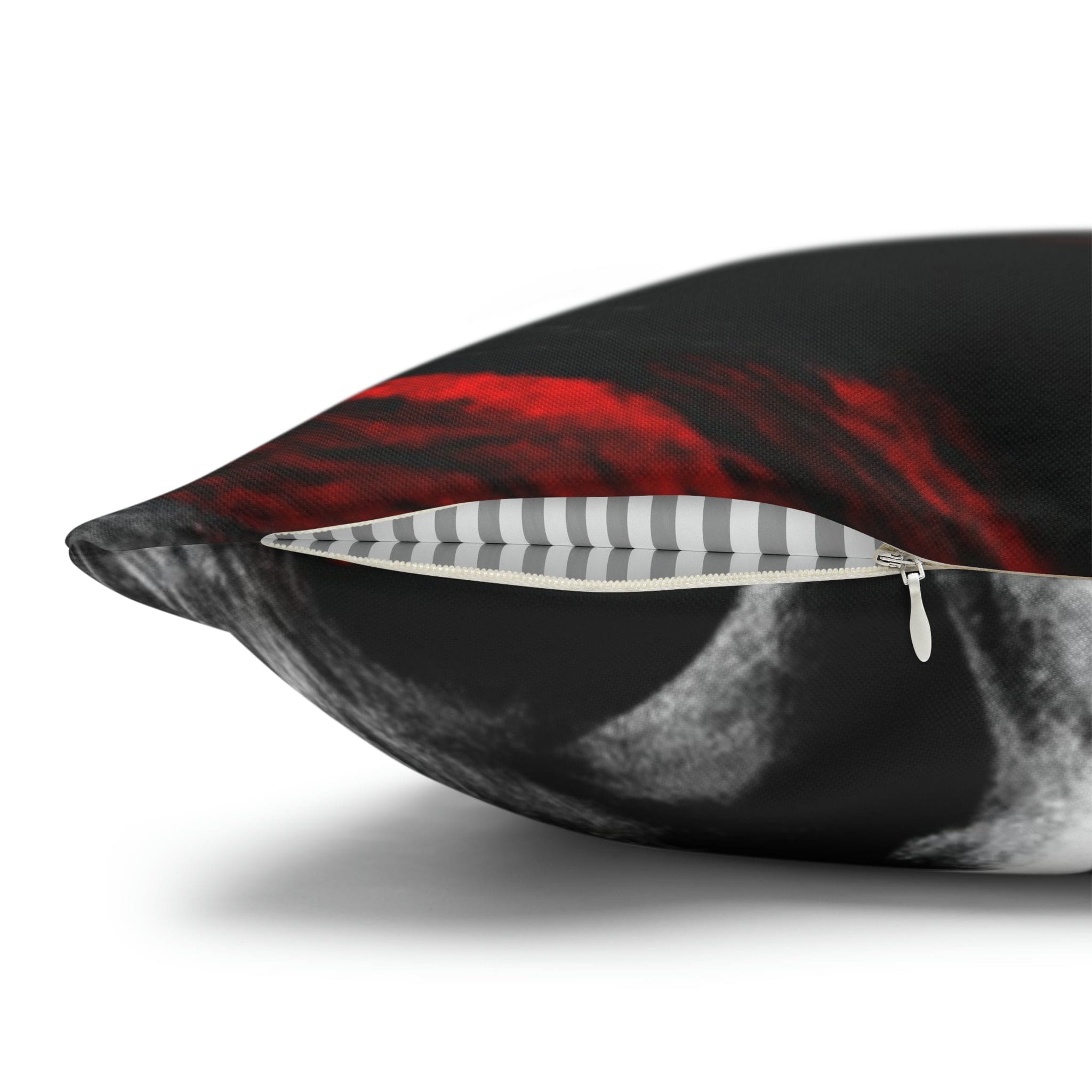 Decorative throw pillow cover featuring a black, red, and white abstract pattern, ideal for enhancing home decor.