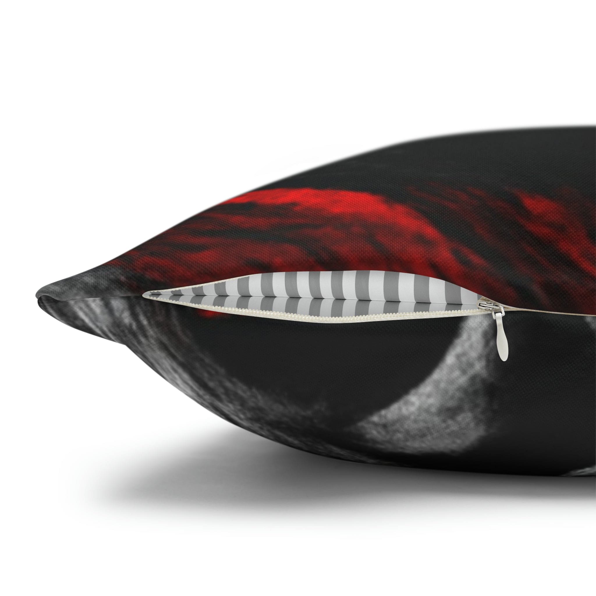 Decorative throw pillow cover featuring a black, red, and white abstract pattern, ideal for enhancing home decor.