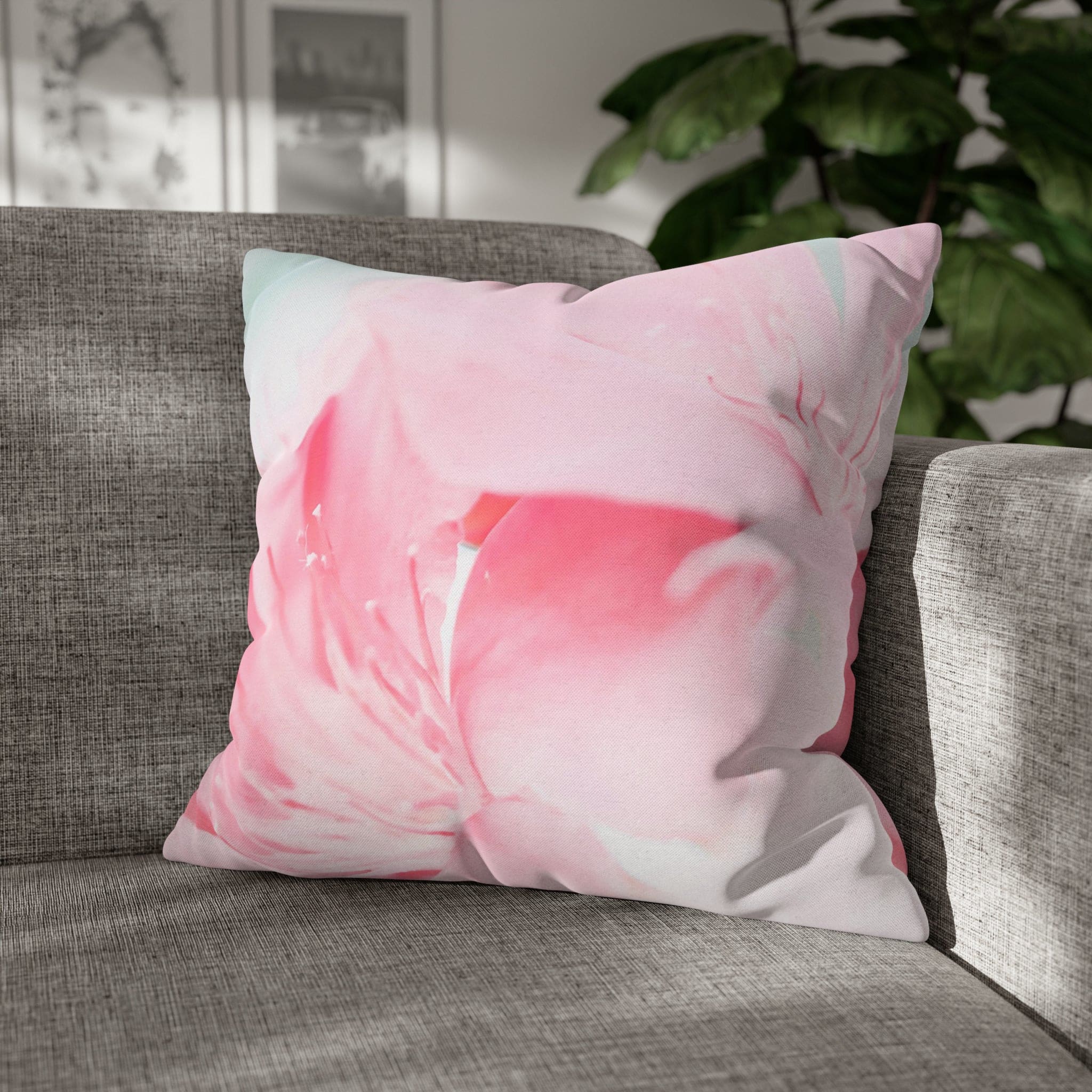 Decorative throw pillow cover featuring a peaceful pink flower bloom design, showcasing vibrant colors and a concealed zipper.