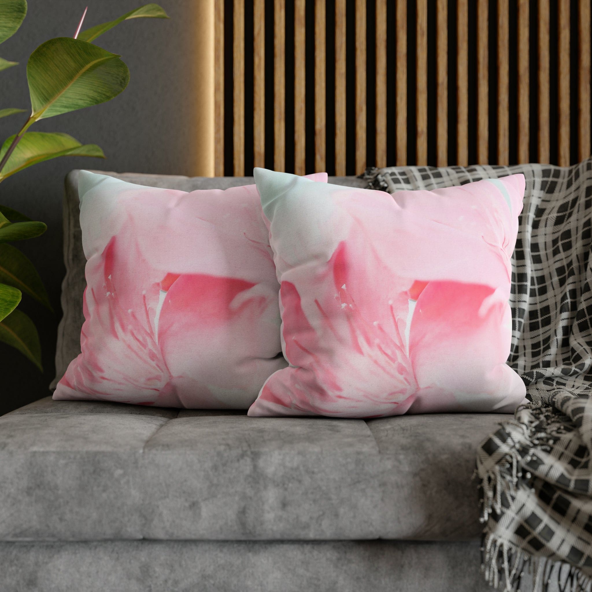 Decorative throw pillow cover featuring a peaceful pink flower bloom design, showcasing vibrant colors and a concealed zipper.