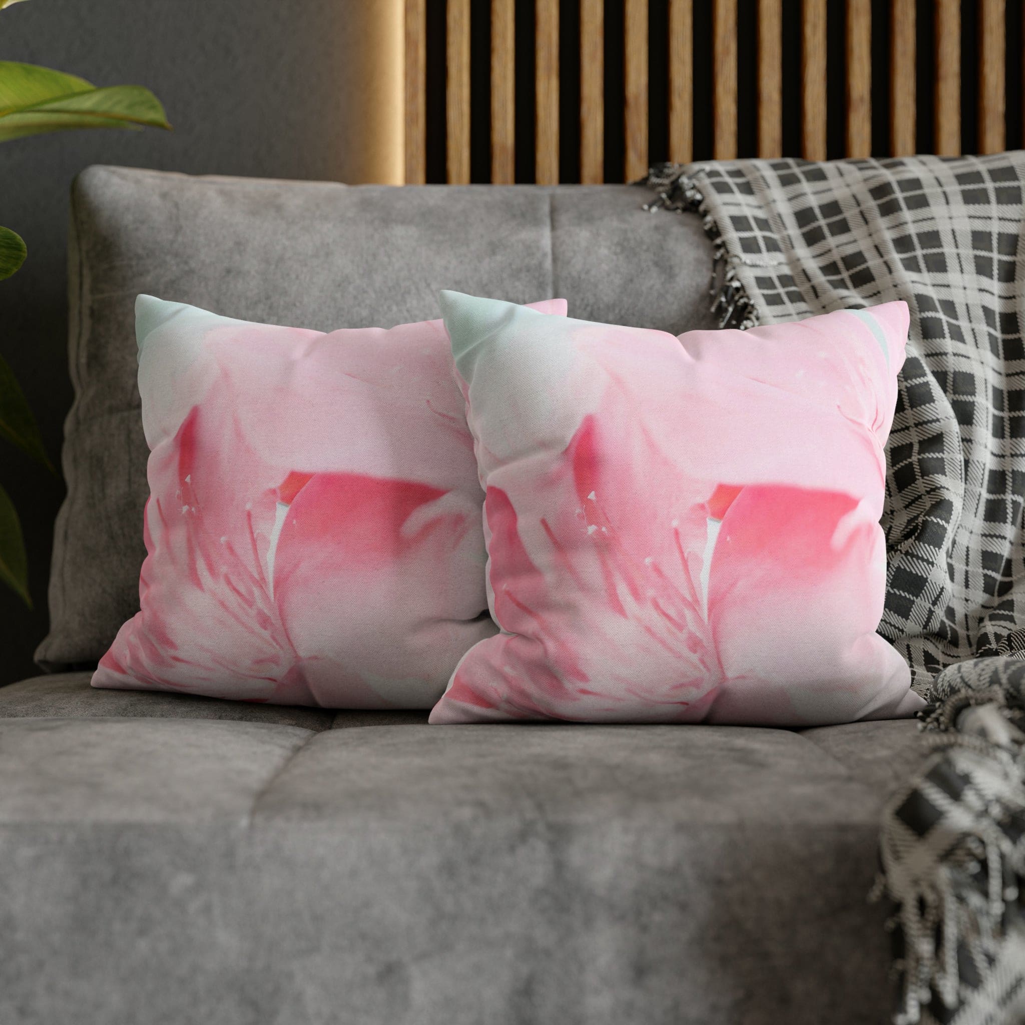 Decorative throw pillow cover featuring a peaceful pink flower bloom design, showcasing vibrant colors and a concealed zipper.