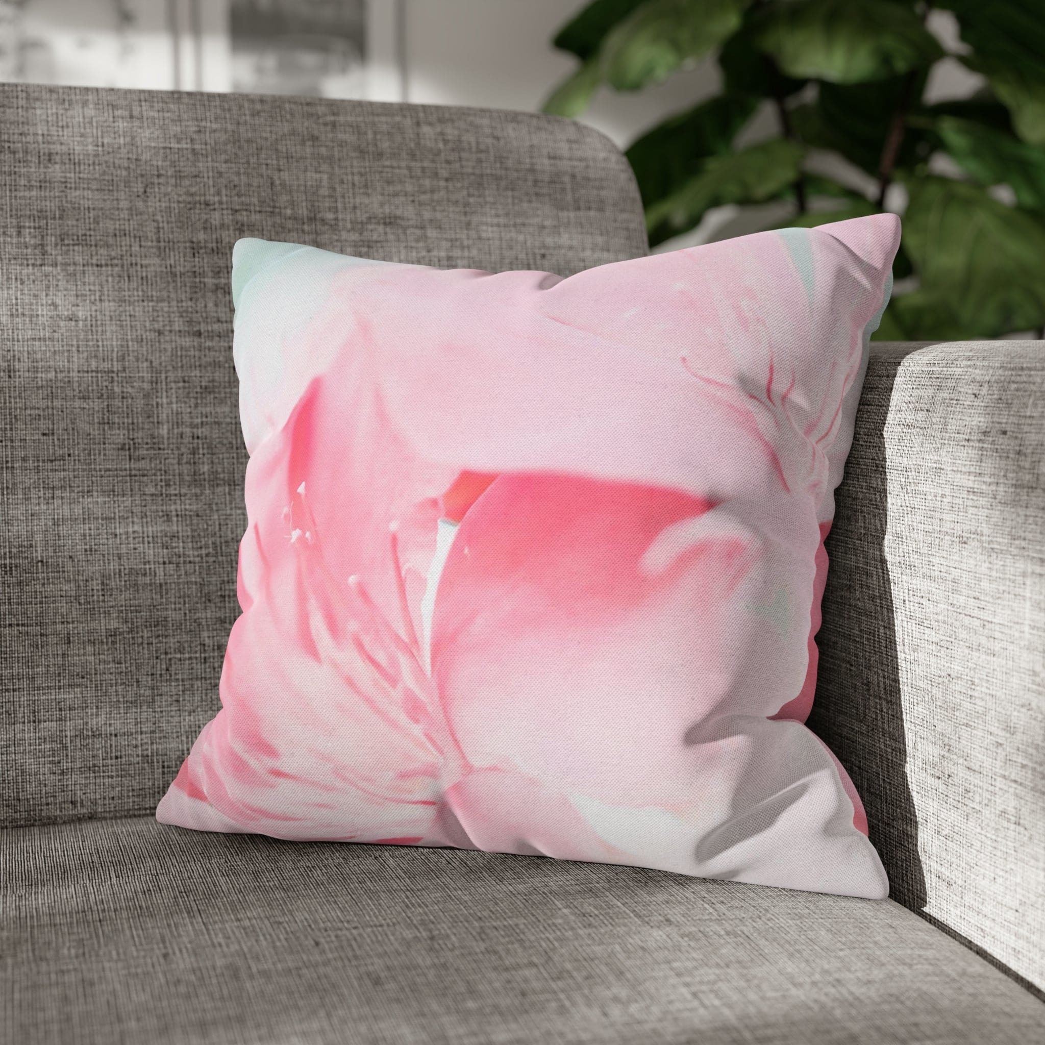 Decorative throw pillow cover featuring a peaceful pink flower bloom design, showcasing vibrant colors and a concealed zipper.