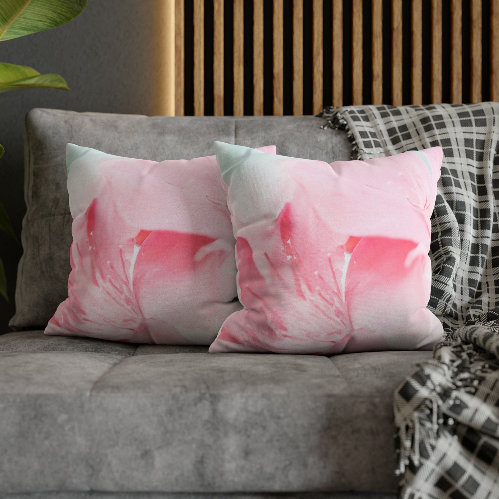 Decorative throw pillow cover featuring a peaceful pink flower bloom design, showcasing vibrant colors and a concealed zipper.