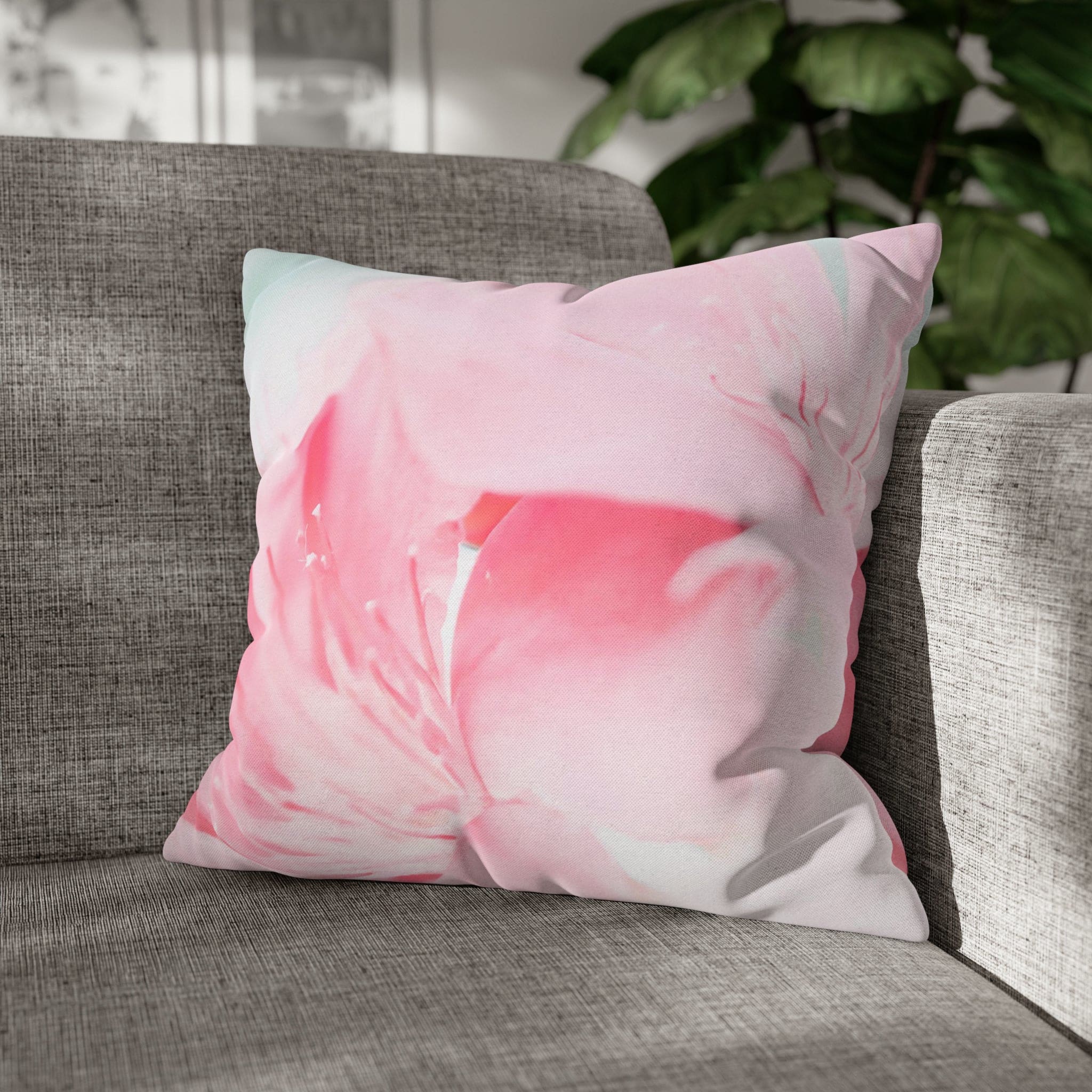 Decorative throw pillow cover featuring a peaceful pink flower bloom design, showcasing vibrant colors and a concealed zipper.