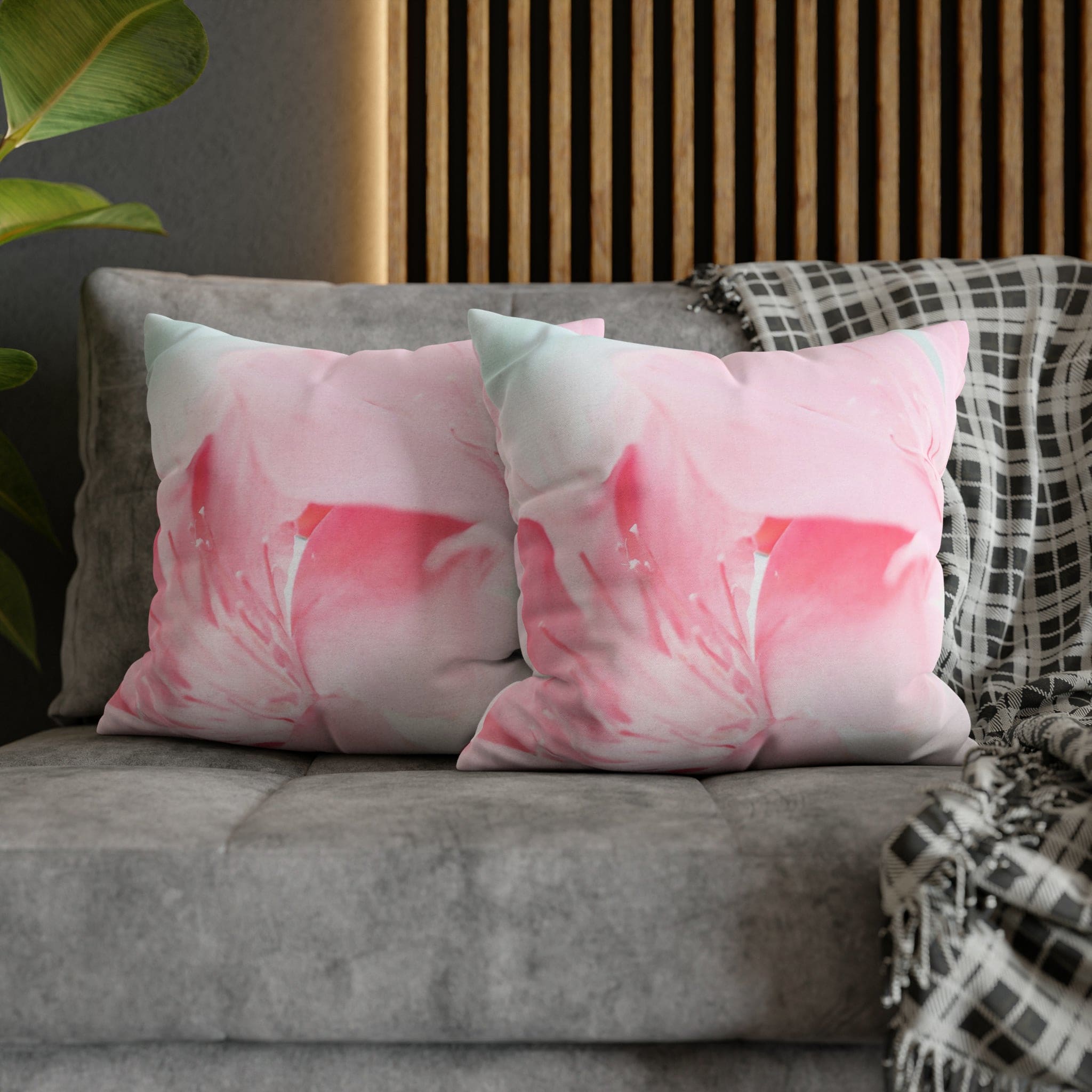 Decorative throw pillow cover featuring a peaceful pink flower bloom design, showcasing vibrant colors and a concealed zipper.