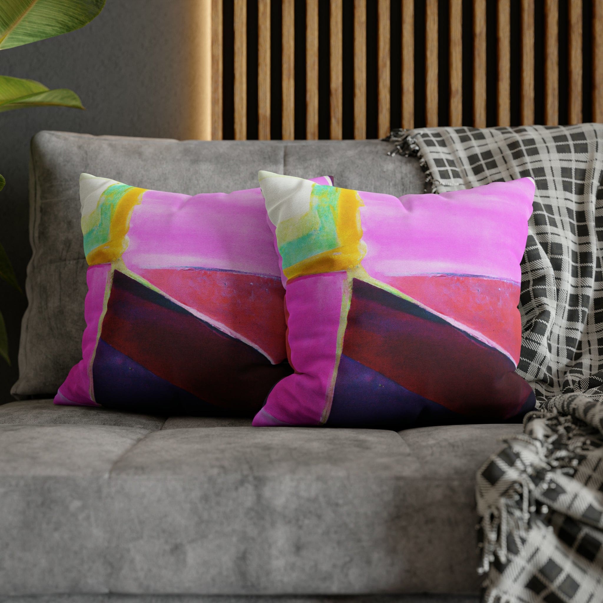 Decorative throw pillow cover featuring a pink, purple, and red geometric pattern, showcasing its vibrant colors and stylish design.