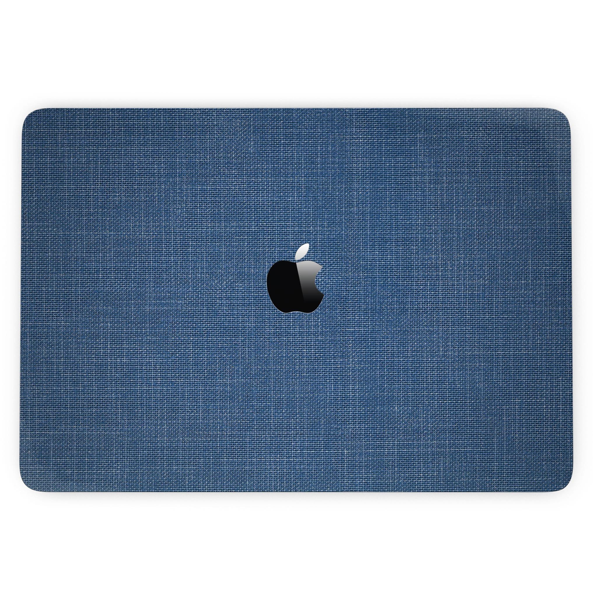 Deep Blue Sea Fabric skin applied to a MacBook Pro with Touch Bar, showcasing vibrant colors and a sleek design.