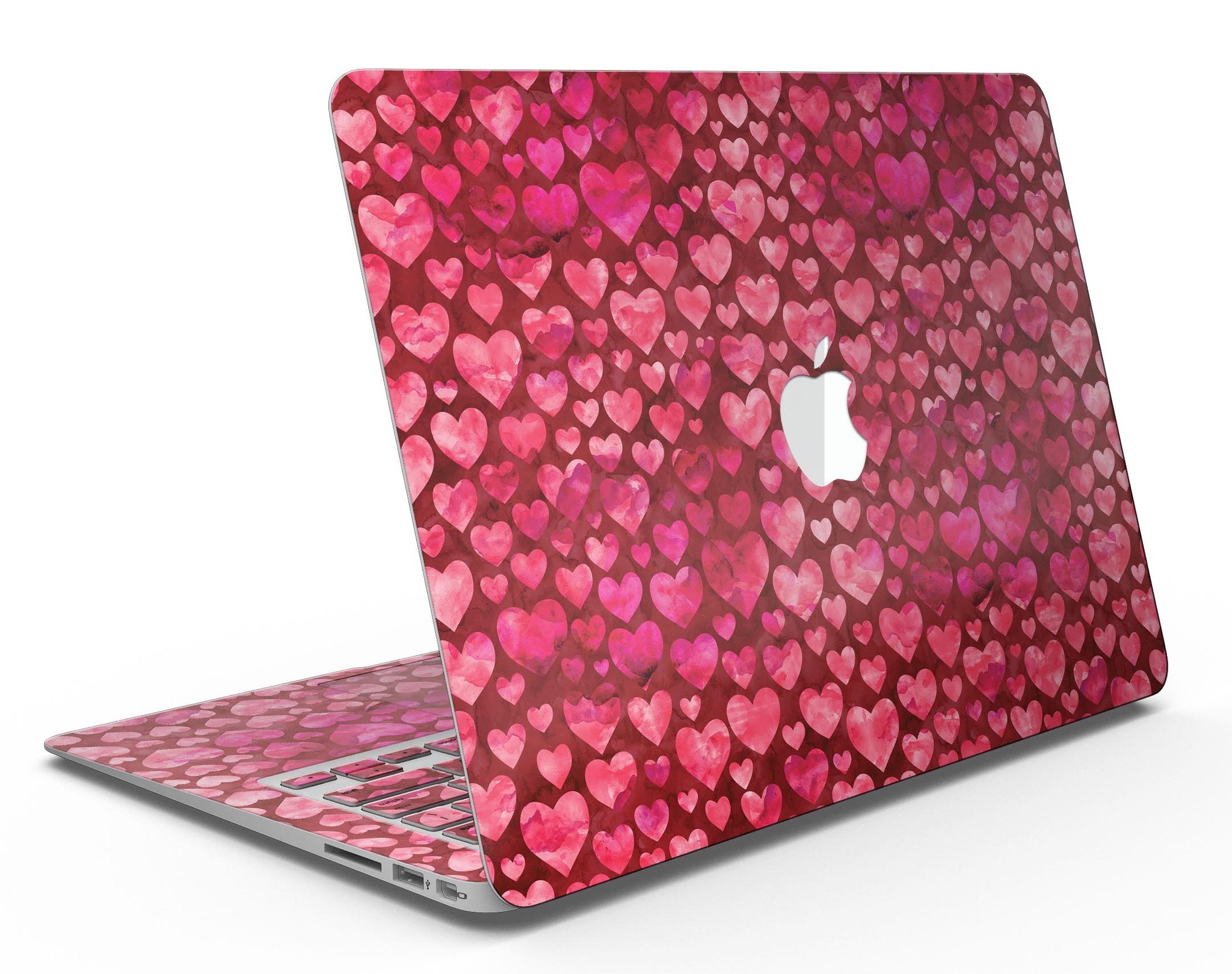 Deep Pink Watercolor Hearts MacBook Air Skin Kit showcasing vibrant heart patterns on a sleek laptop surface.