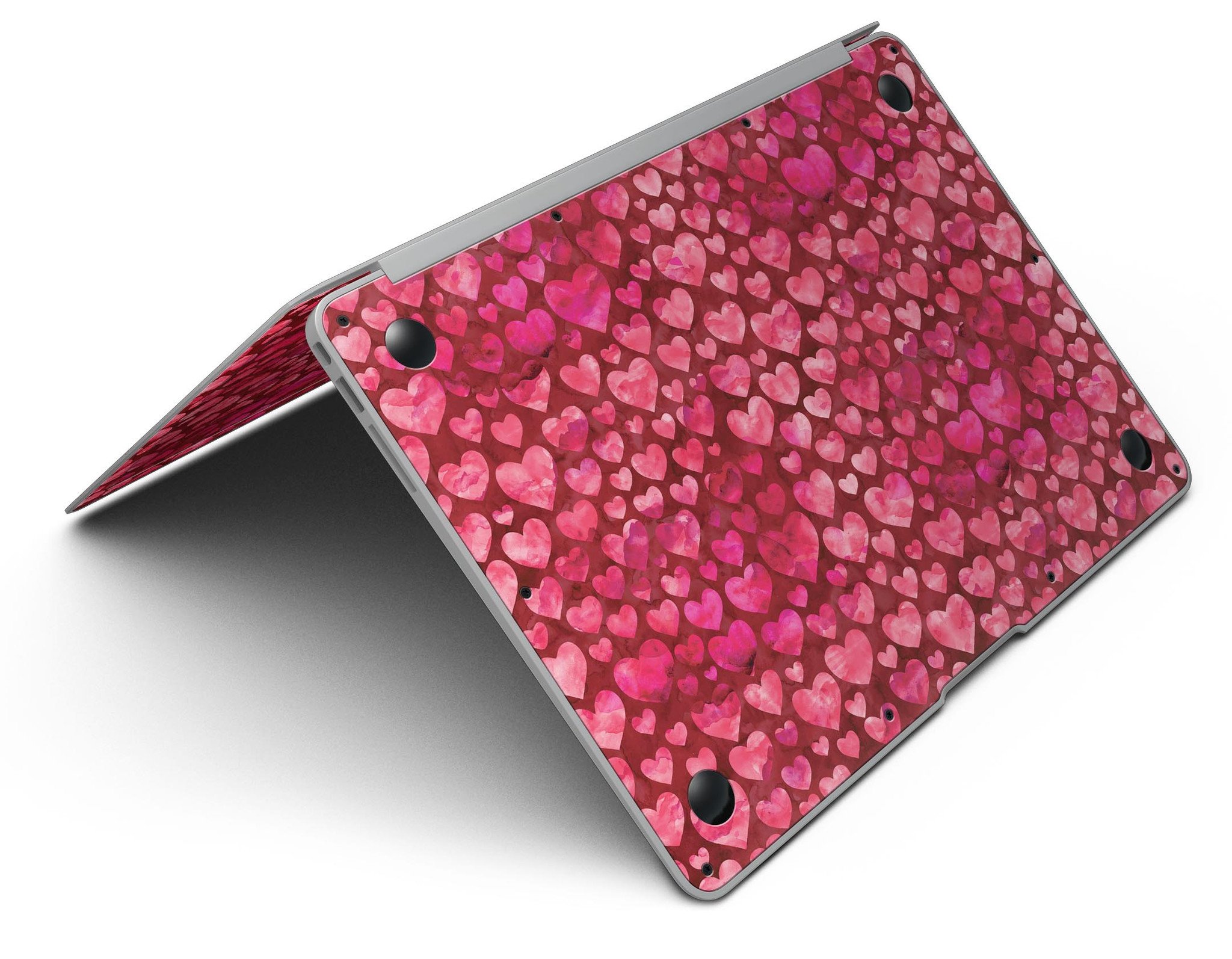 Deep Pink Watercolor Hearts MacBook Air Skin Kit showcasing vibrant heart patterns on a sleek laptop surface.