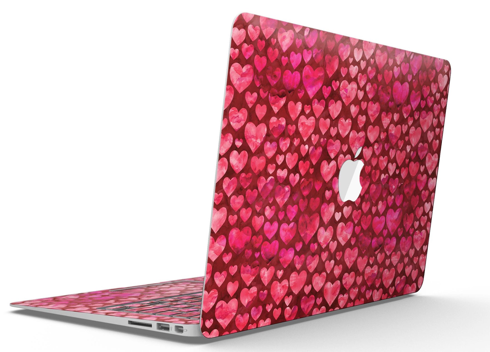 Deep Pink Watercolor Hearts MacBook Air Skin Kit showcasing vibrant heart patterns on a sleek laptop surface.