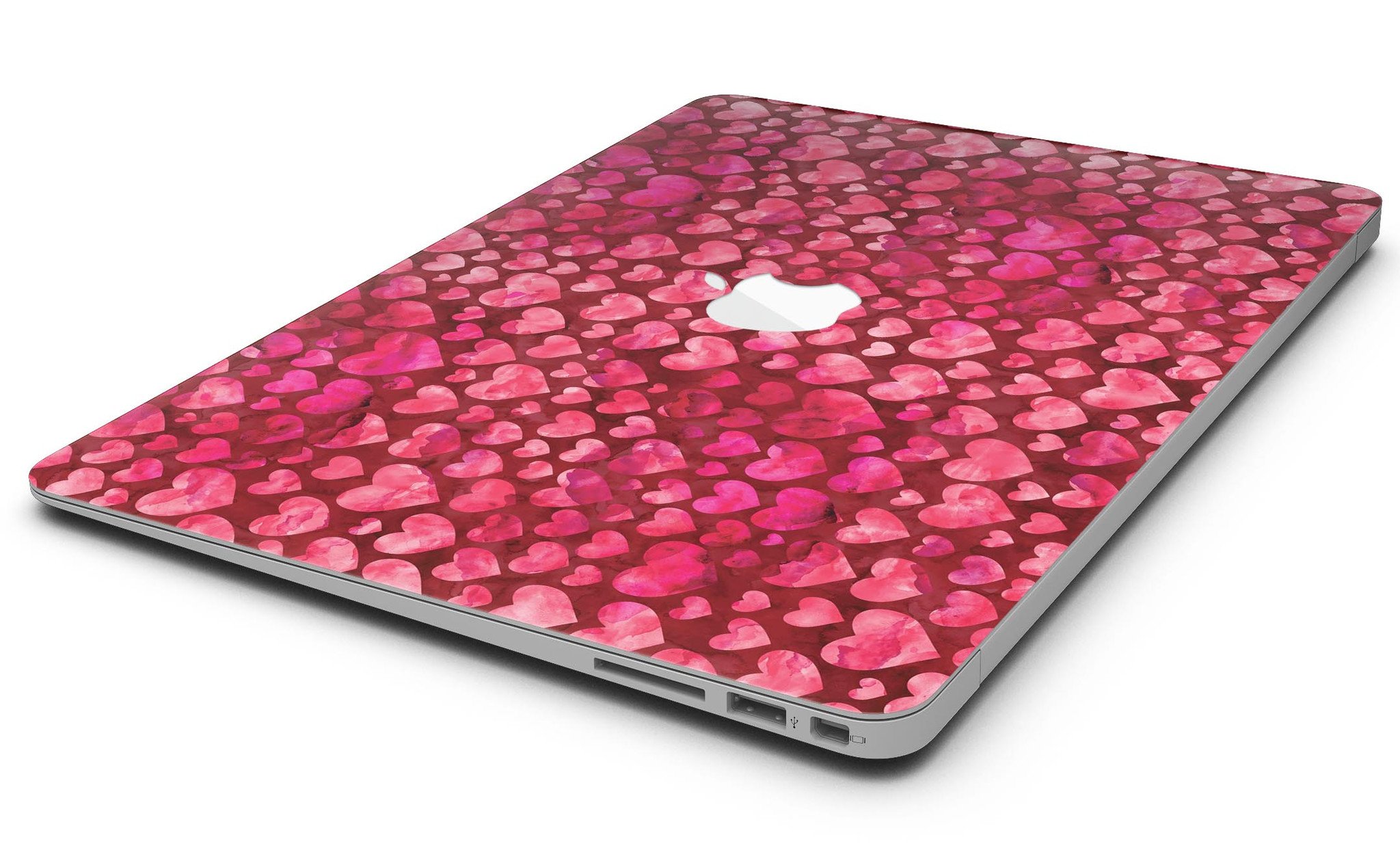 Deep Pink Watercolor Hearts MacBook Air Skin Kit showcasing vibrant heart patterns on a sleek laptop surface.