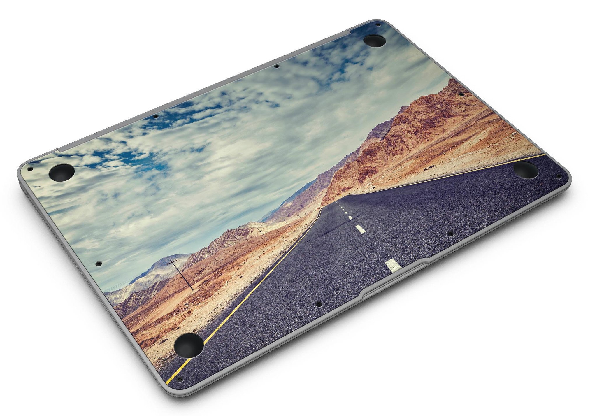 Desert Road MacBook Air Skin Kit showcasing stylish design and premium vinyl material.