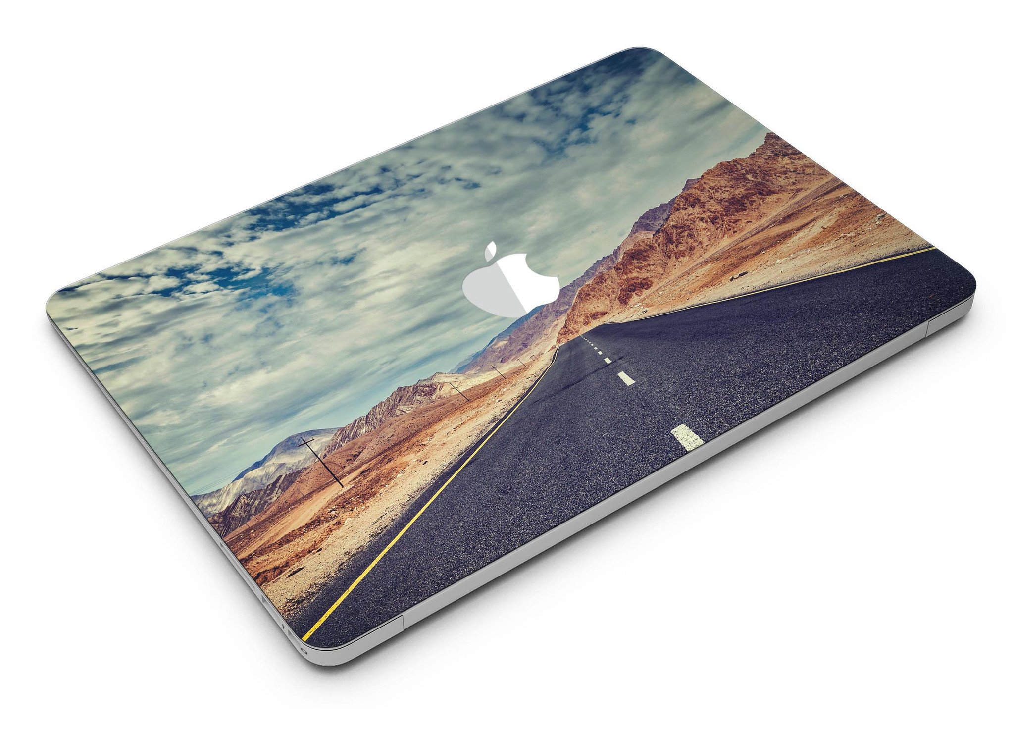 Desert Road MacBook Air Skin Kit showcasing stylish design and premium vinyl material.