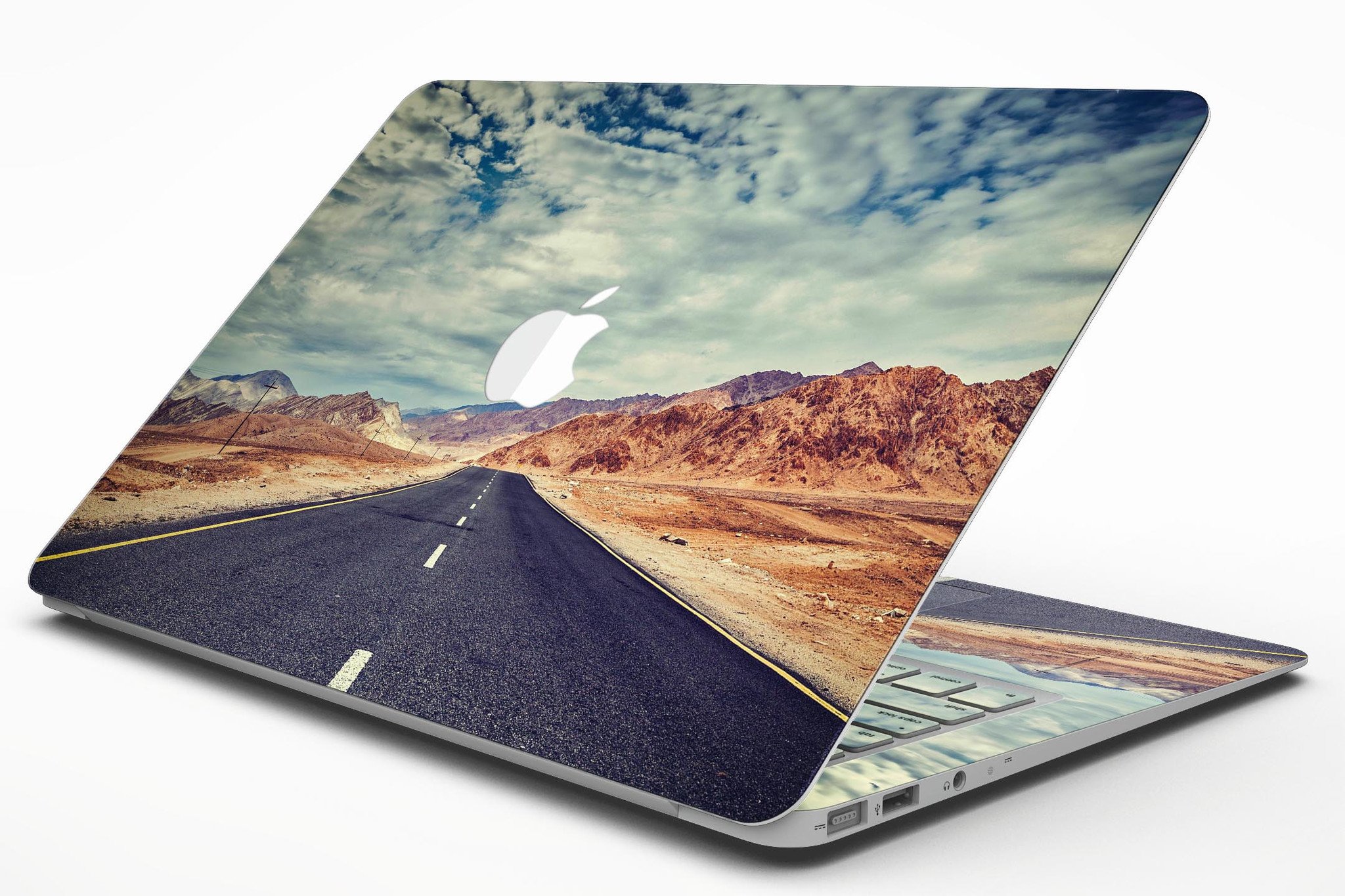 Desert Road MacBook Air Skin Kit showcasing stylish design and premium vinyl material.