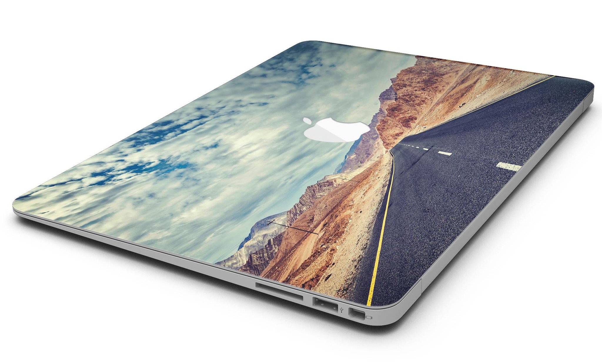 Desert Road MacBook Air Skin Kit showcasing stylish design and premium vinyl material.