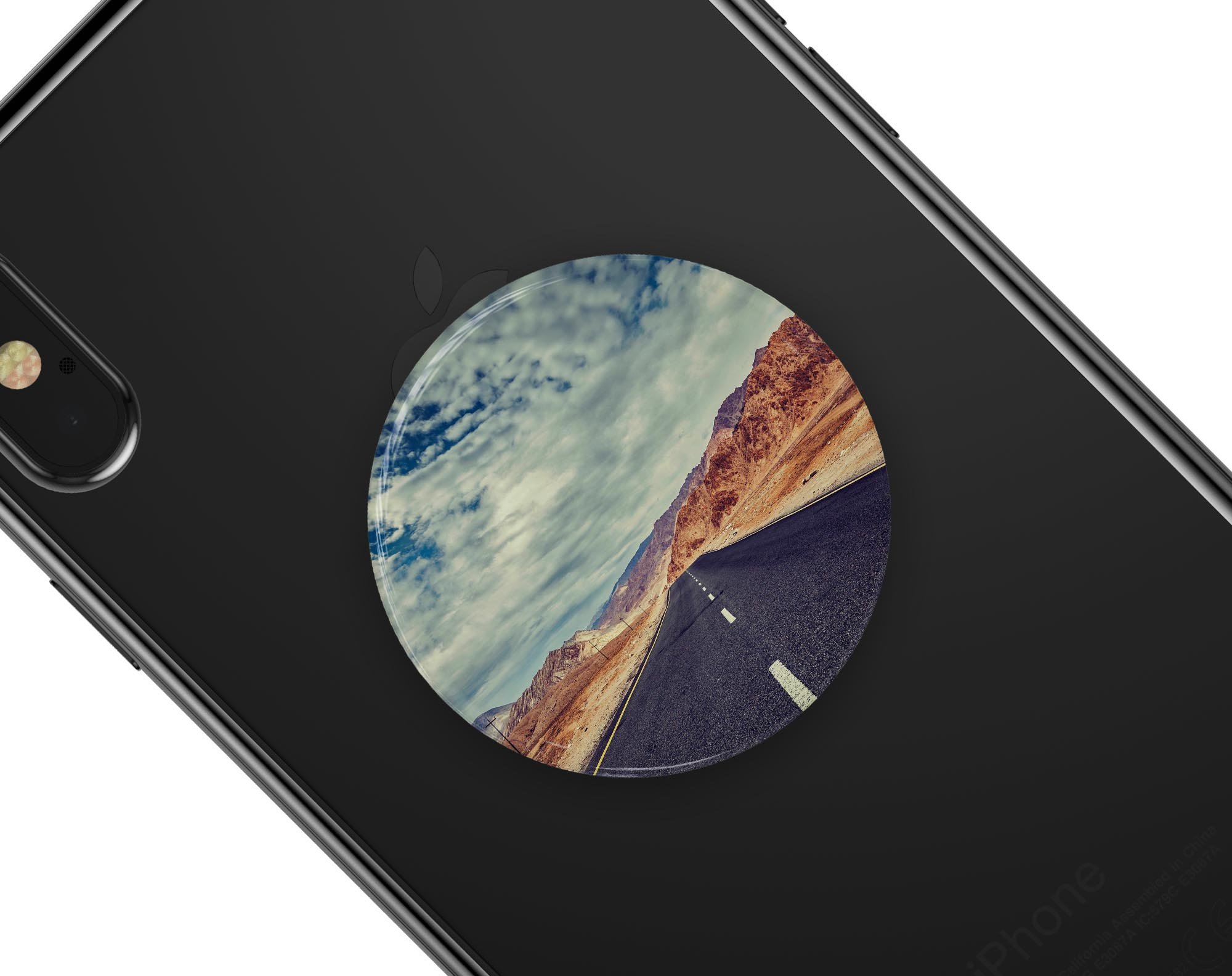 Desert Road Skin Kit for PopSockets featuring vibrant design on a smartphone grip.