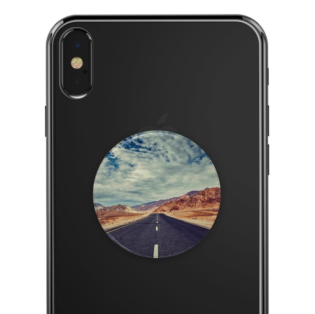 Desert Road Skin Kit for PopSockets featuring vibrant design on a smartphone grip.