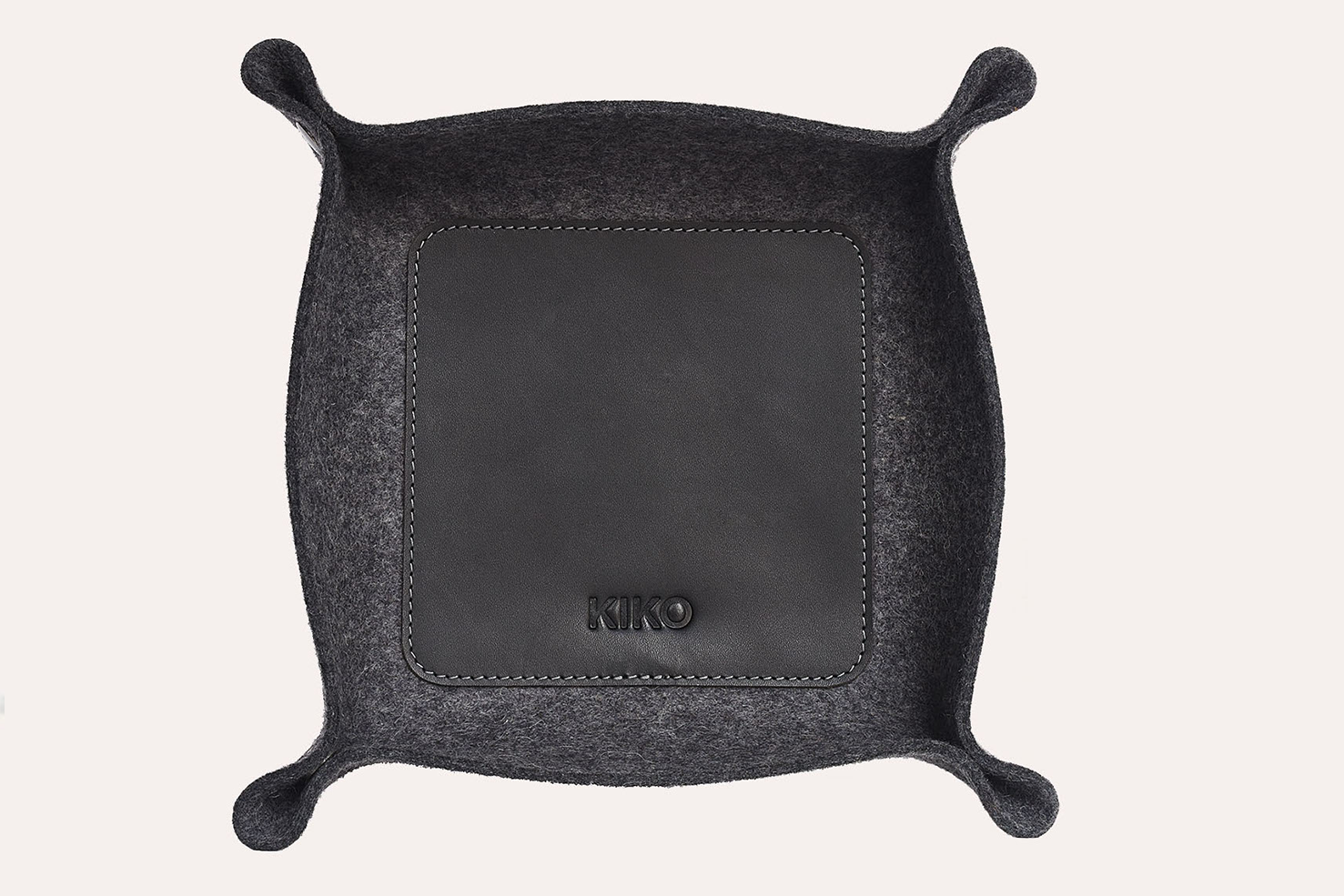 Chic Desk Tray made of soft grey wool felt and leather, designed to organize essentials like keys and phone.