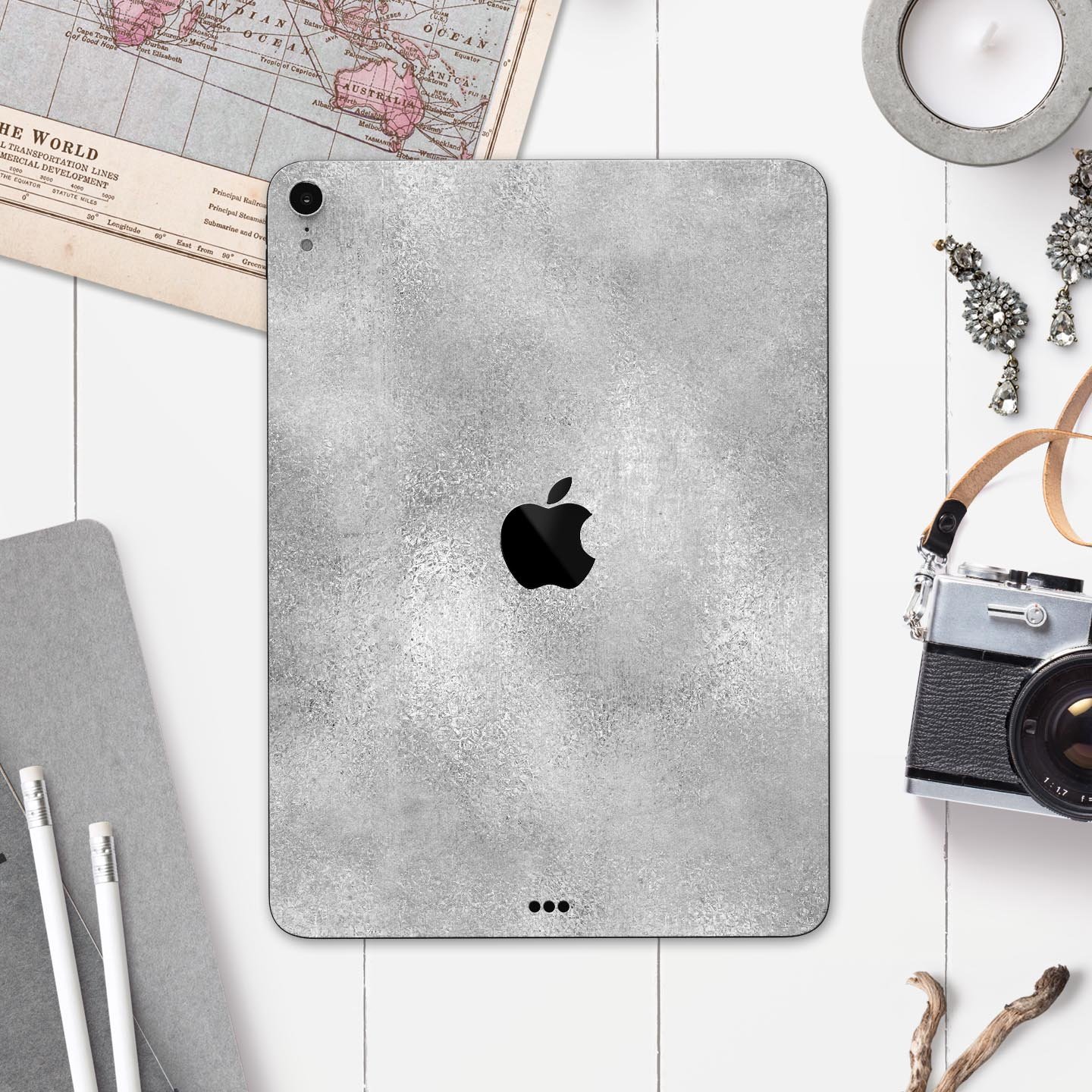 Distressed Silver Texture v11 skin decal for Apple device, showcasing a sleek design and premium finish.