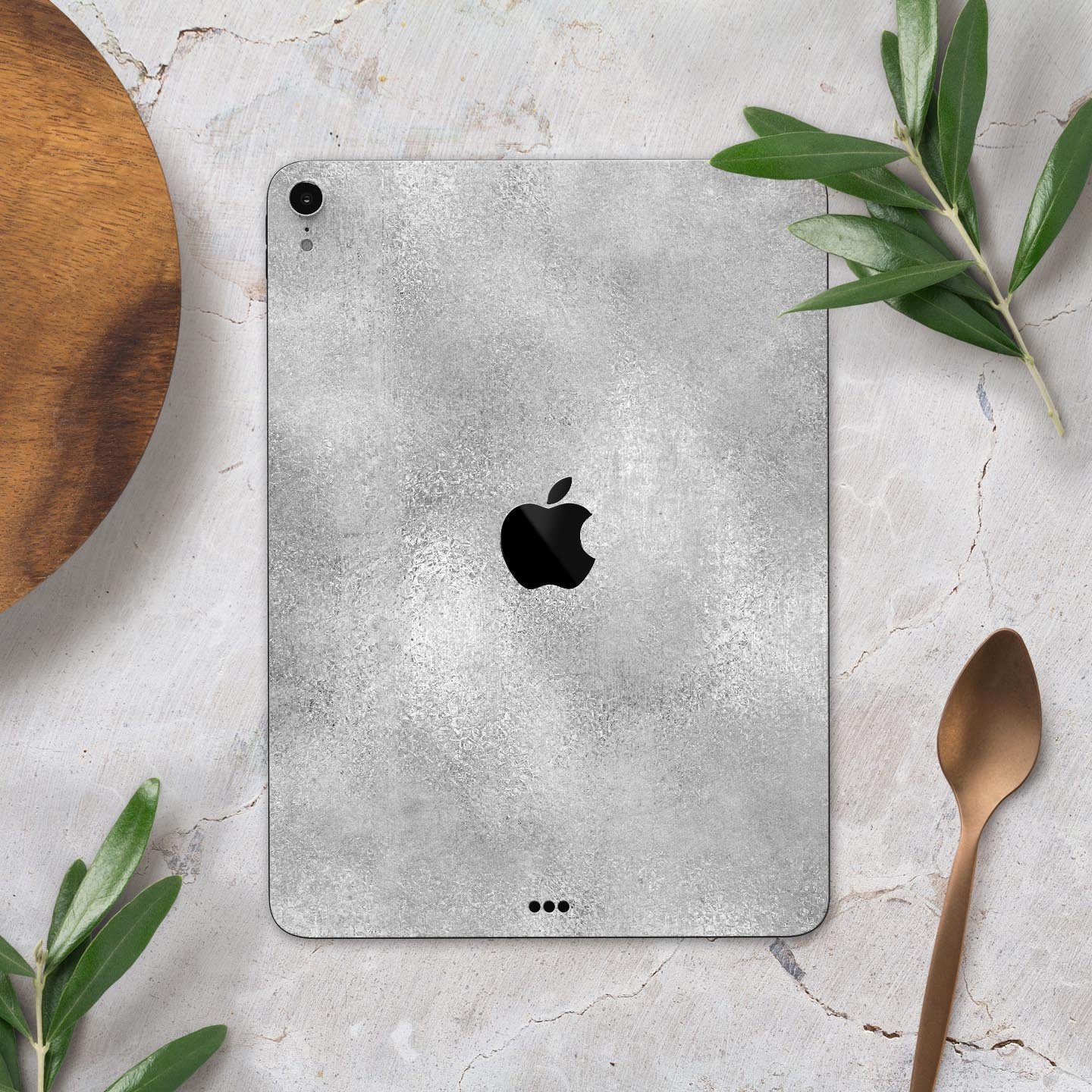 Distressed Silver Texture v11 skin decal for Apple device, showcasing a sleek design and premium finish.