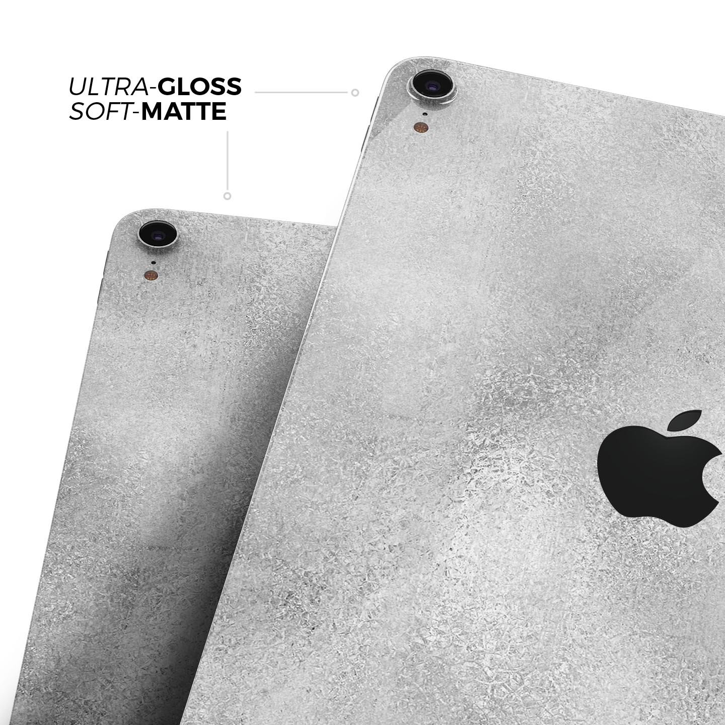 Distressed Silver Texture v11 skin decal for Apple device, showcasing a sleek design and premium finish.