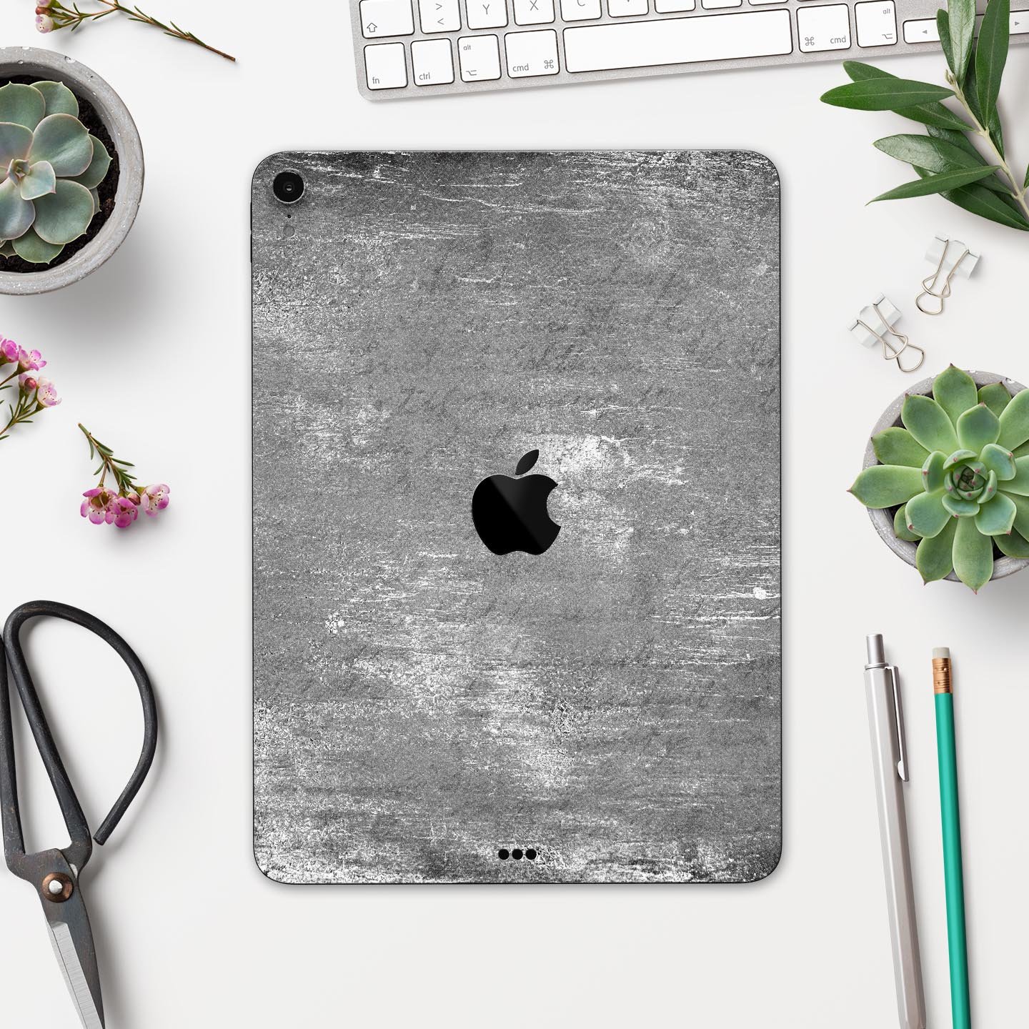 Distressed Silver Texture skin decal for Apple iPad, showcasing a sleek design and premium finish.