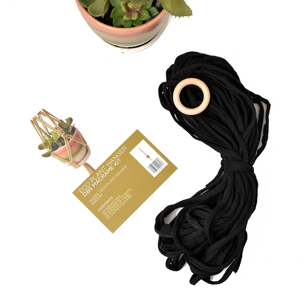 DIY Eco Macramé Plant Hanger Kit with eco-friendly materials and colorful cords displayed on a wooden surface.