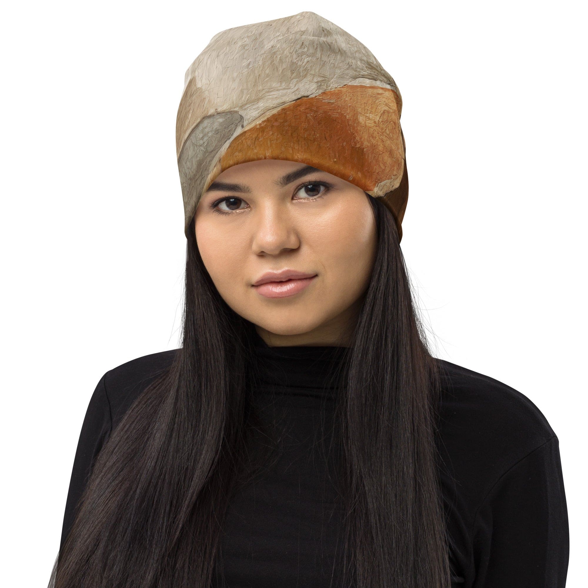 Double-layered beanie hat featuring an abstract stone print design, showcasing its soft fabric and stylish appearance.