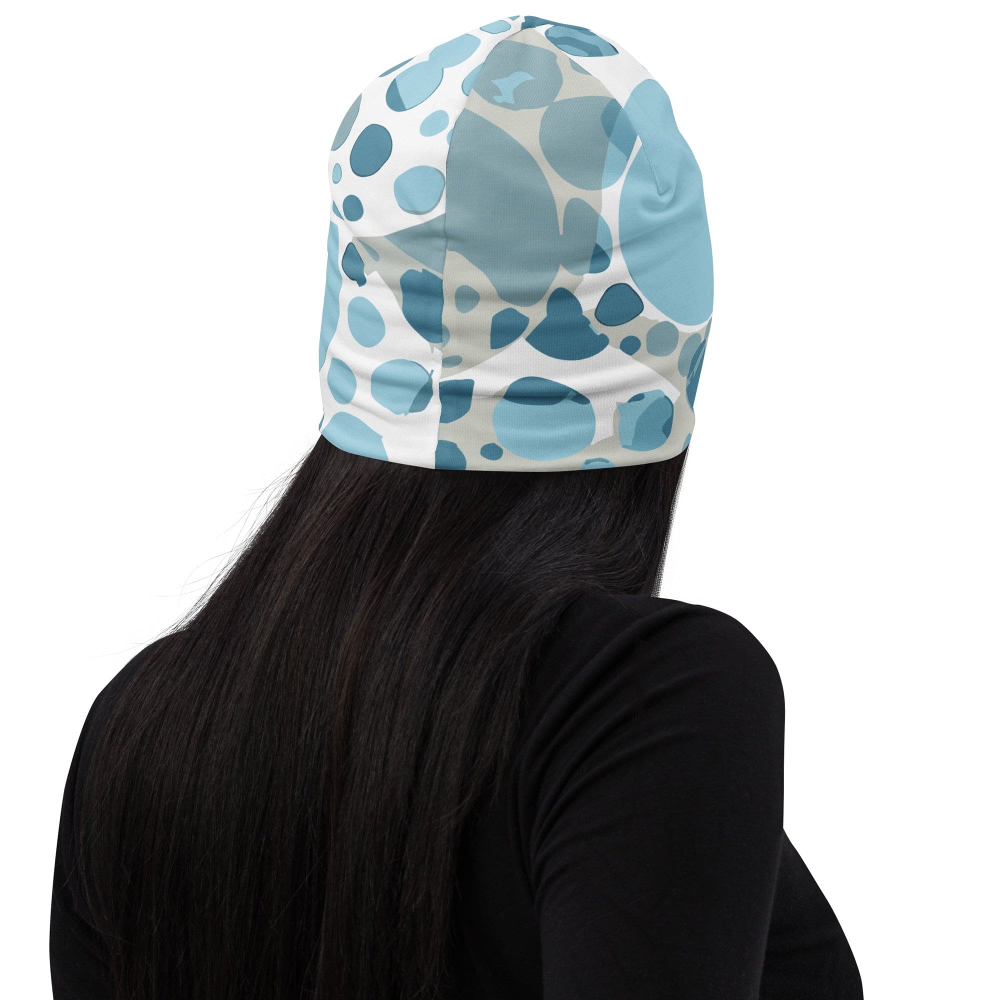 Double-layered beanie hat featuring a blue and white circular spotted design, perfect for winter and stylish outfits.