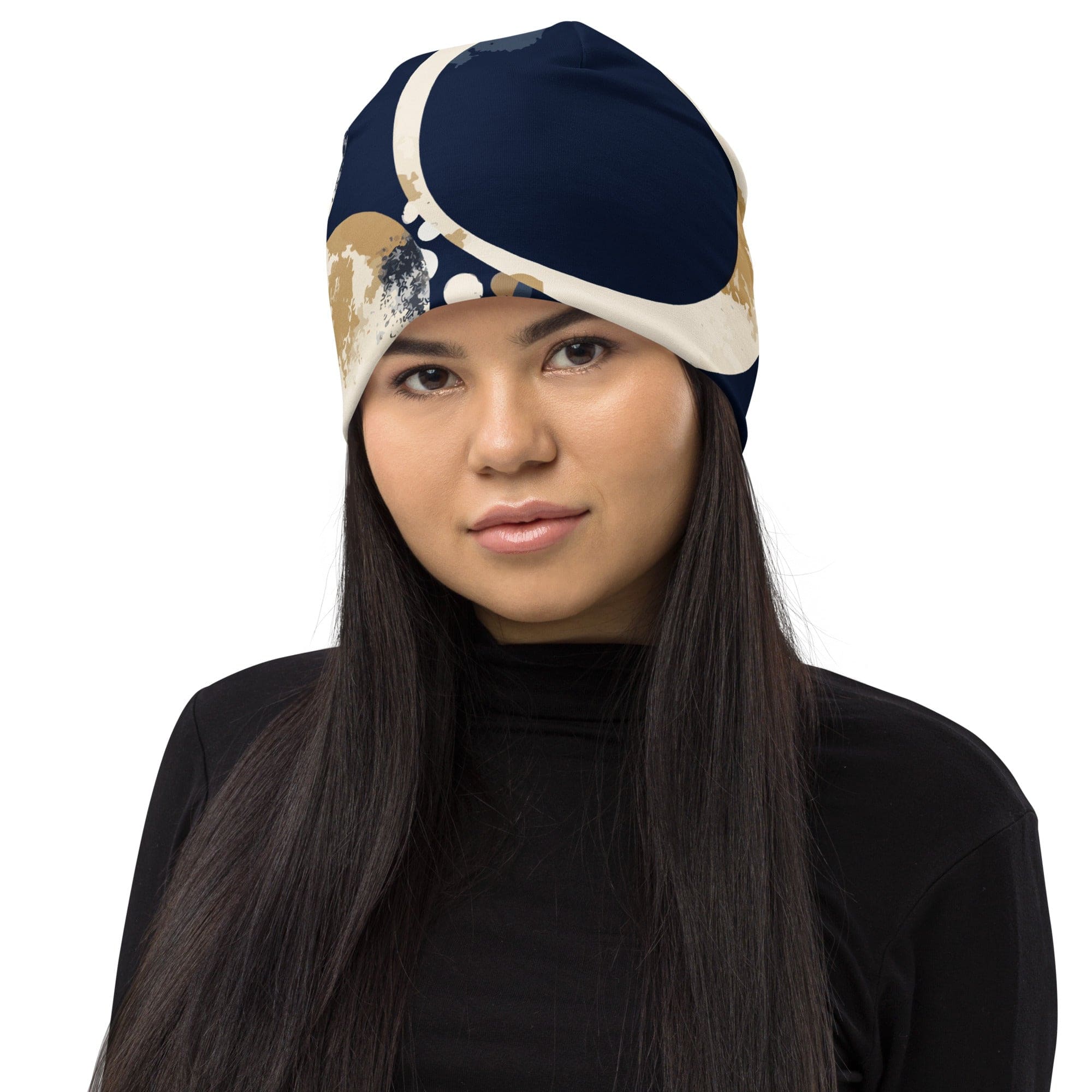 Double-layered beanie hat in blue and beige spotted print, showcasing its soft fabric and stylish design.