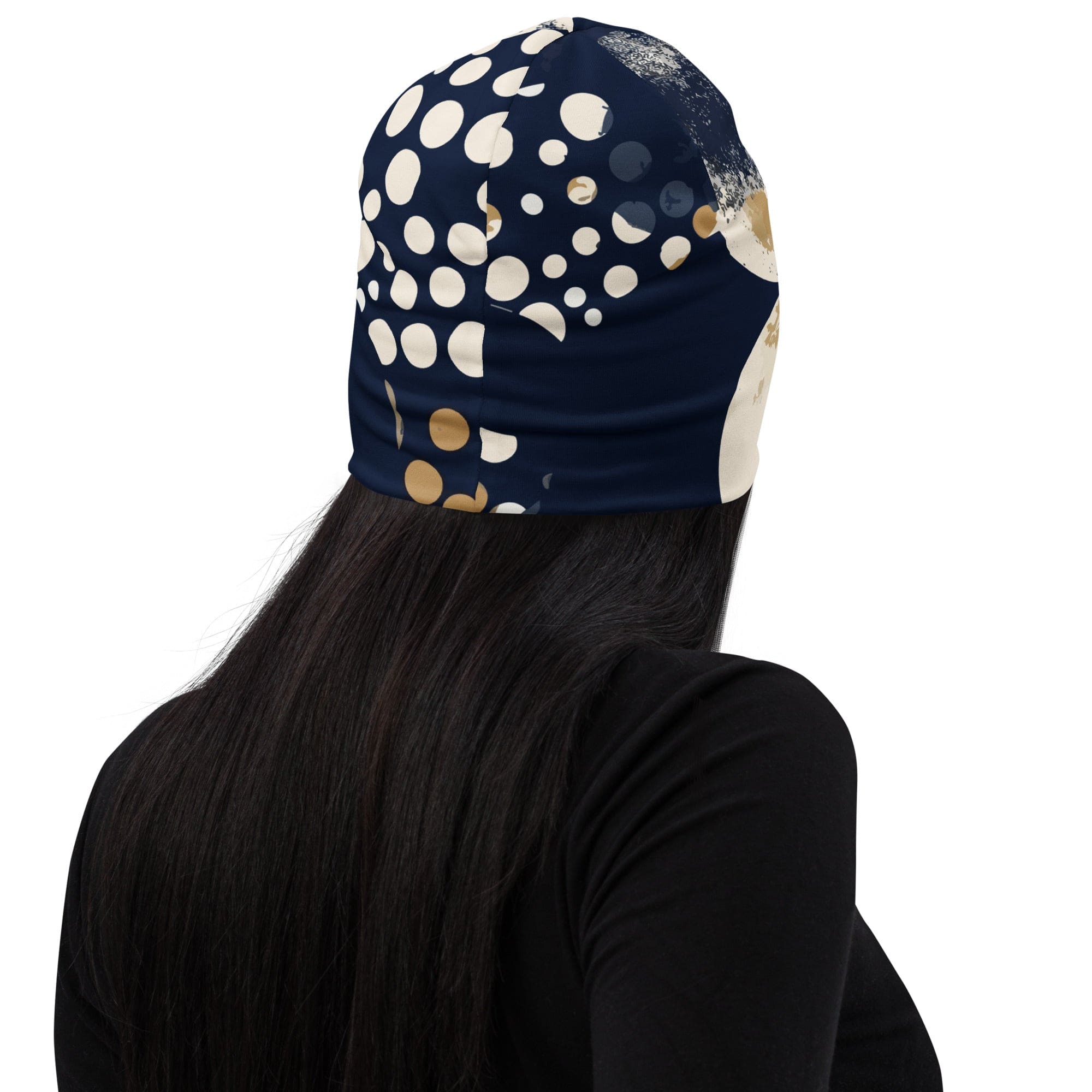 Double-layered beanie hat in blue and beige spotted print, showcasing its soft fabric and stylish design.