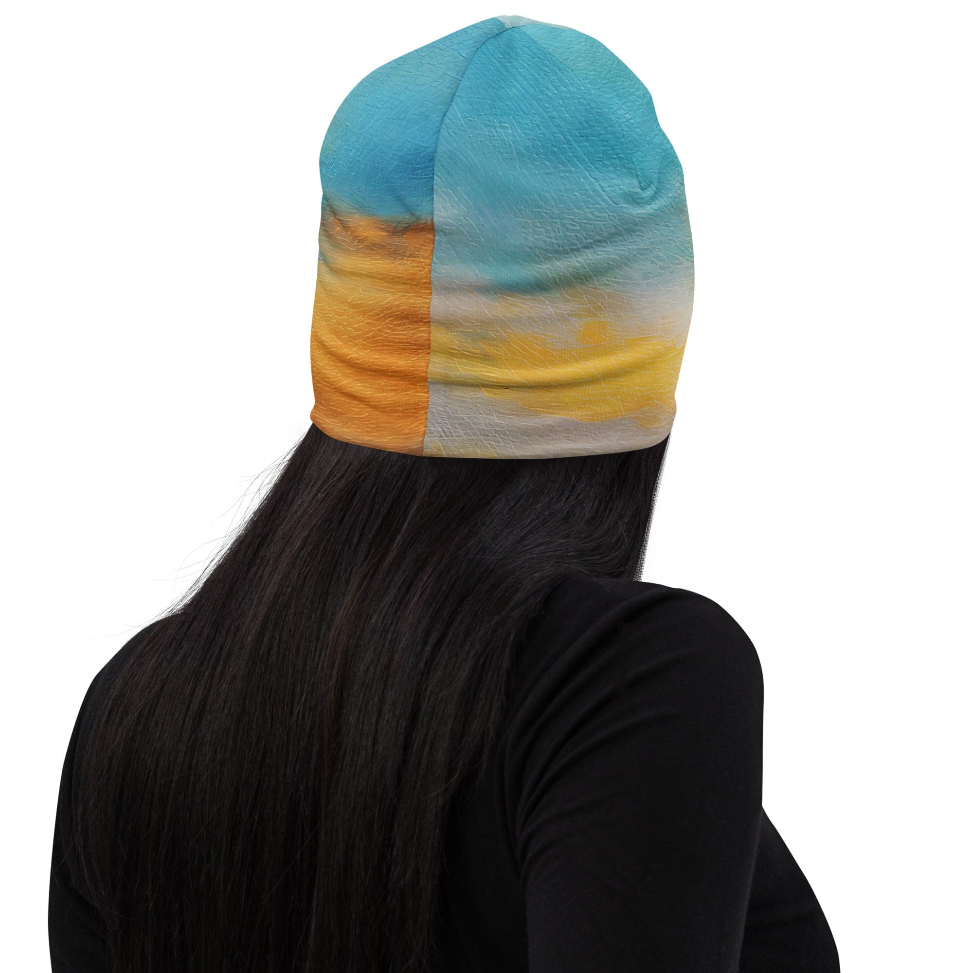 Double-layered beanie hat featuring a vibrant Blue Ocean Golden Sunset Print, perfect for stylish warmth in winter and spring.