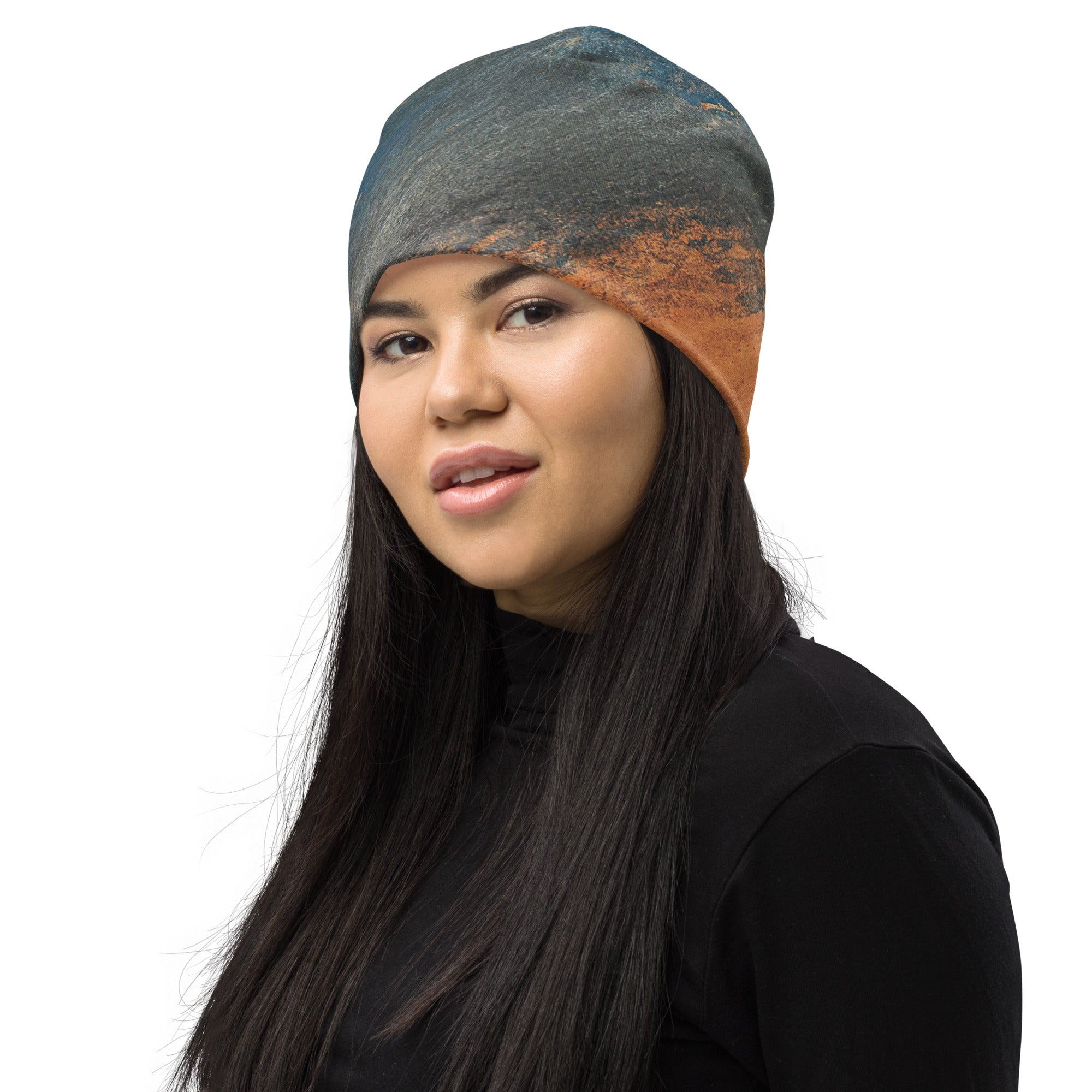 Double-layered beanie hat featuring a blue and orange abstract pattern, perfect for winter and stylish outfits.