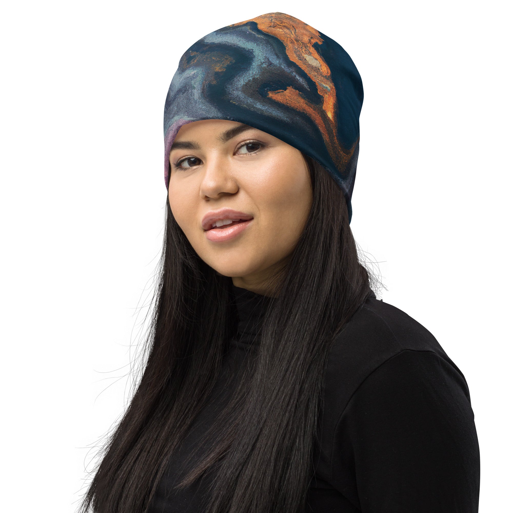 Double-layered beanie hat featuring a blue and pink marble swirl print, perfect for winter and stylish outfits.