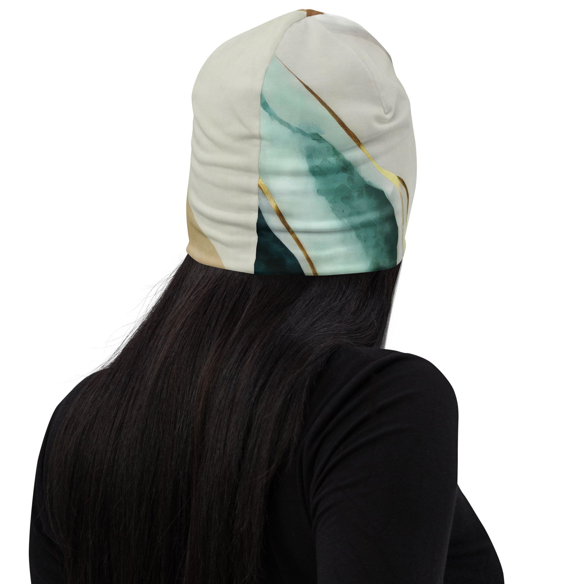 Double-layered beanie hat in cream white and green marbled print, showcasing its soft fabric and stylish design.