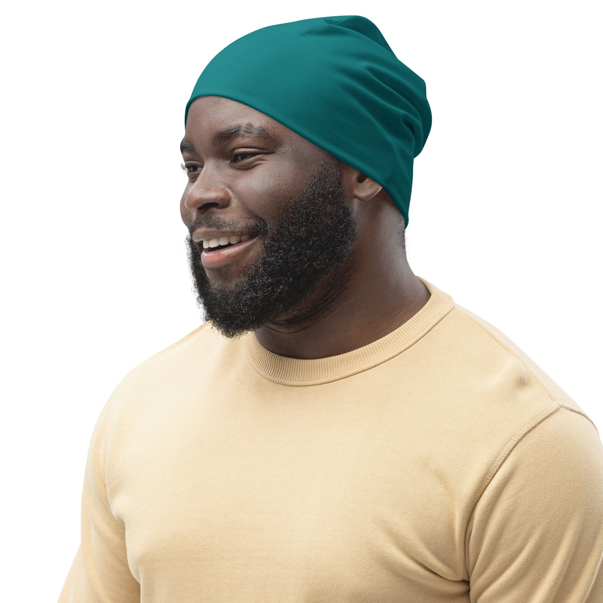 A cozy double-layered beanie hat in dark teal green, showcasing its soft fabric and stylish design.