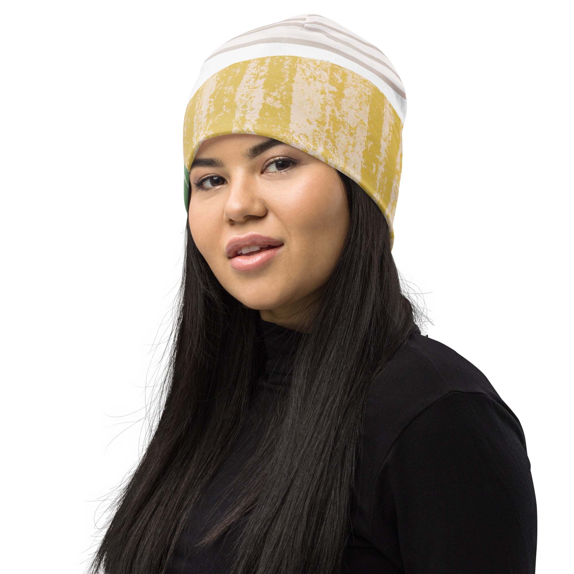 Double-layered green beanie hat with textured boho pattern, showcasing its soft fabric and stylish design.