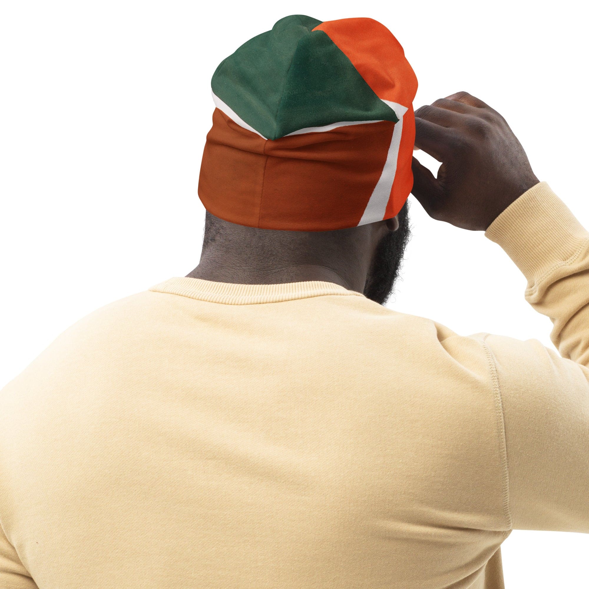 Double-layered beanie hat featuring an orange and green boho pattern, perfect for stylish warmth in any season.